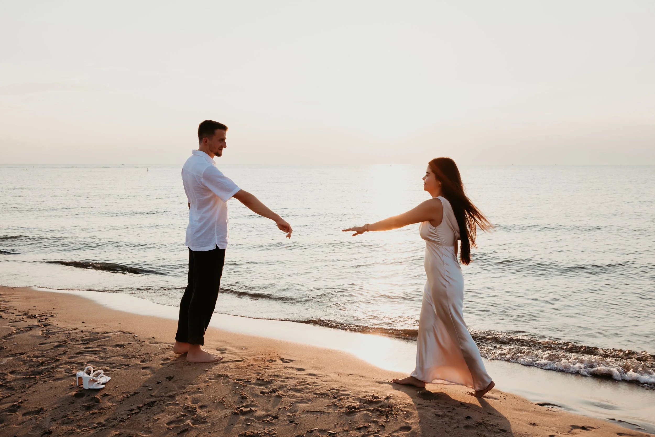 Playful Beach Engagement Photos on Lake Michigan