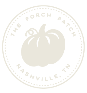 A circular logo with a silhouette of a pumpkin in the center and the text 'The Porch Patsch Nashville, TN' around it.