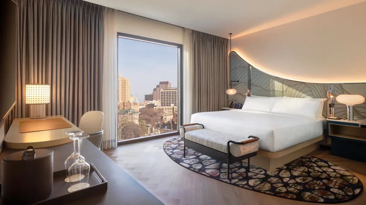 The-Monarch-San-Antonio-Curio-Collection-by-Hilton-King-Guest-Room.webp