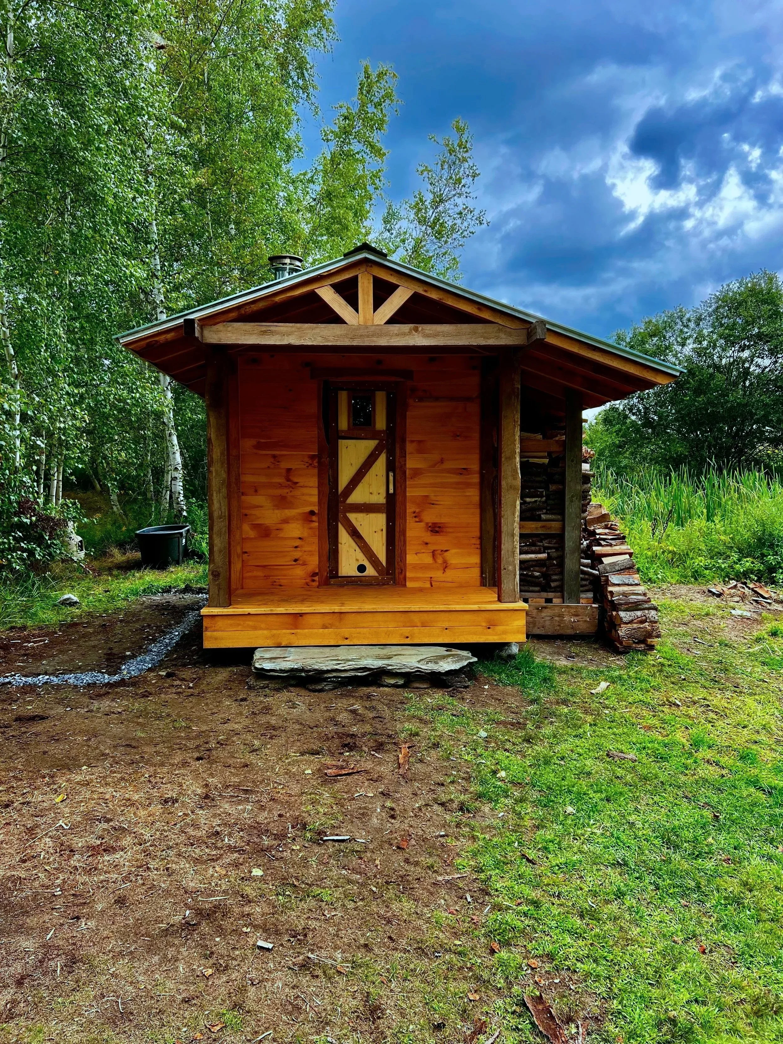 A custom-designed and built sauna, crafted with local cedar and reclaimed wood.