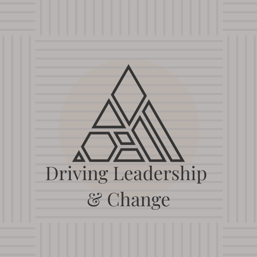 A logo with a geometric mountain design above the text 'Driving Leadership & Change.'