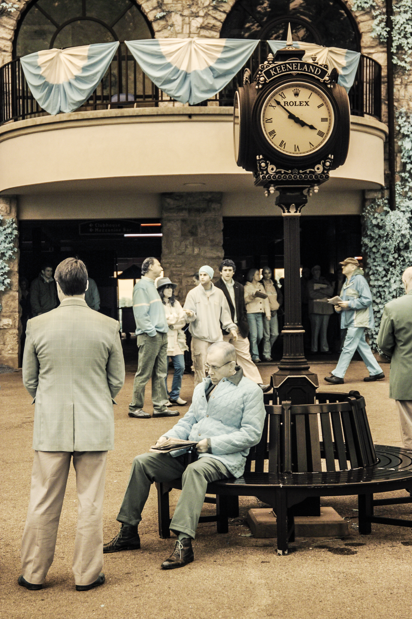 Infrared photograph of horse racing enthusiasts between races at Keeneland Race Track in Lexington, Kentucky.