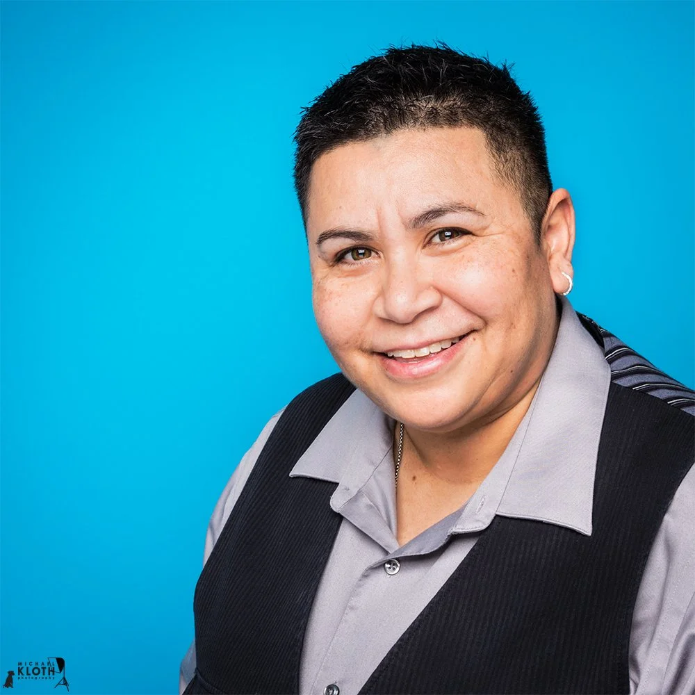 Headshot of a woman wearing a vest.jpg