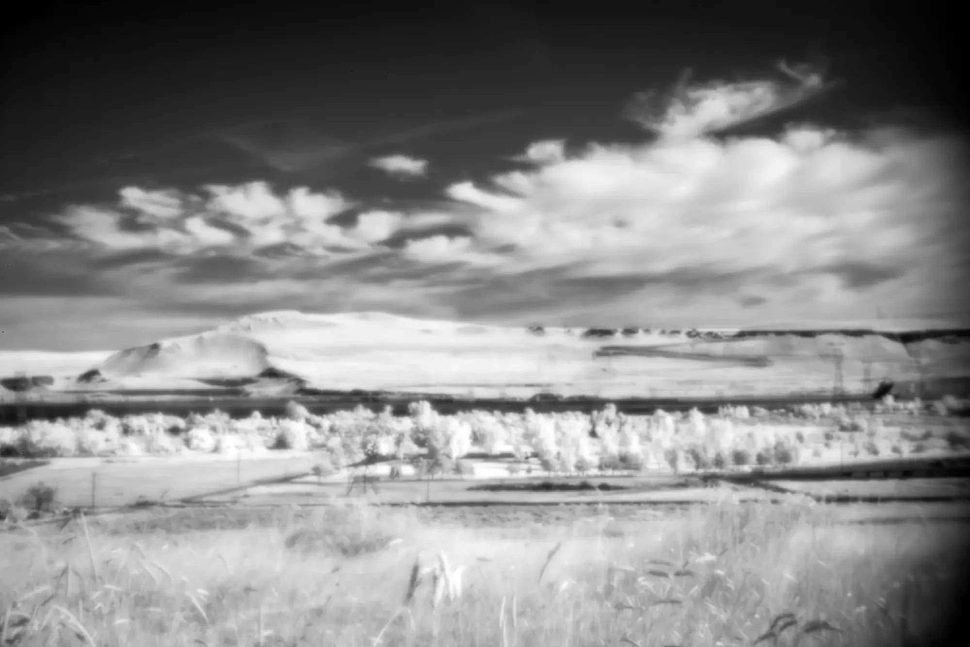 Pinhole_Basalt_and_Cirrus.webp