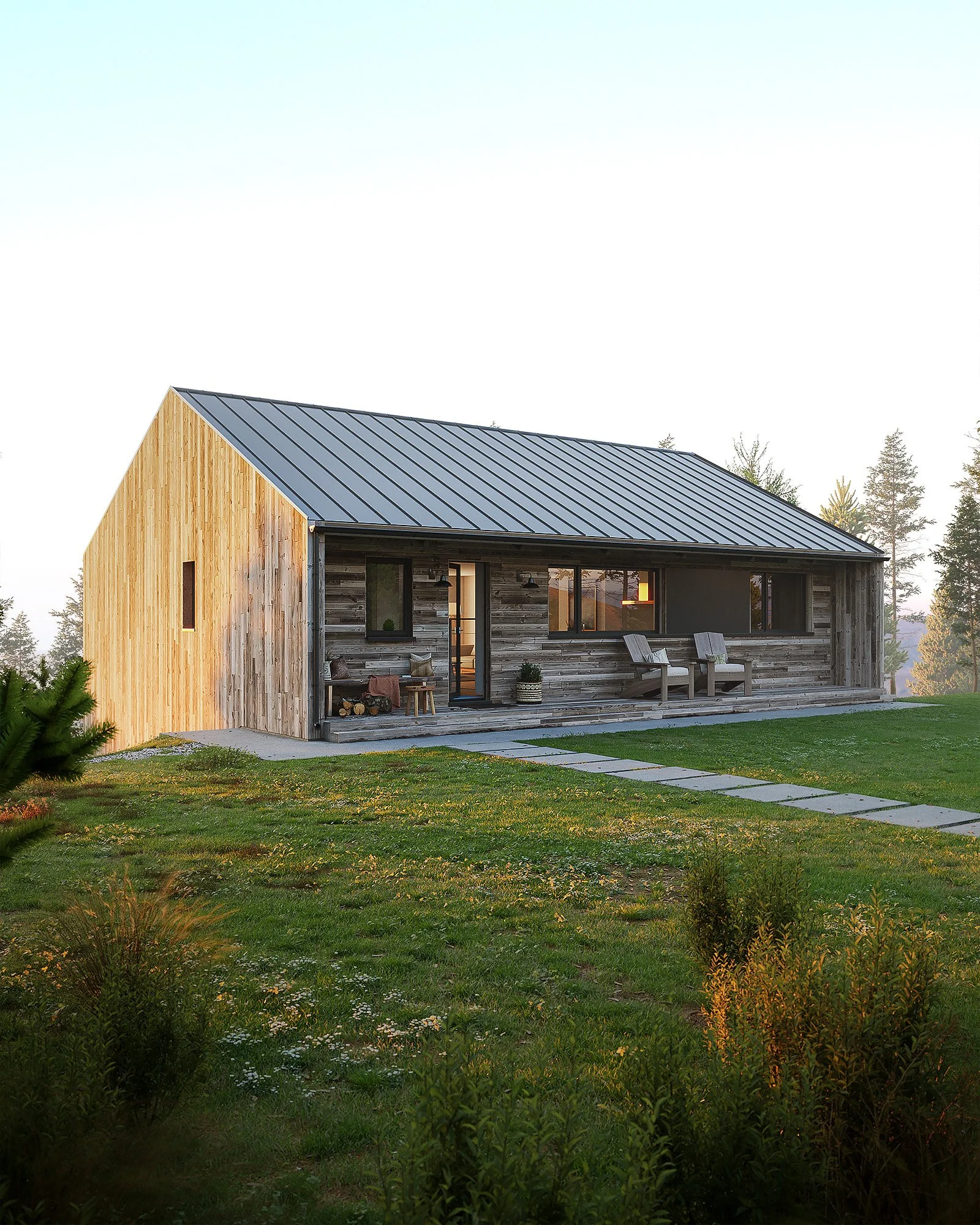 A modern barn-style house with a wood exterior and metal roof, surrounded by a grassy yard and trees in the background.