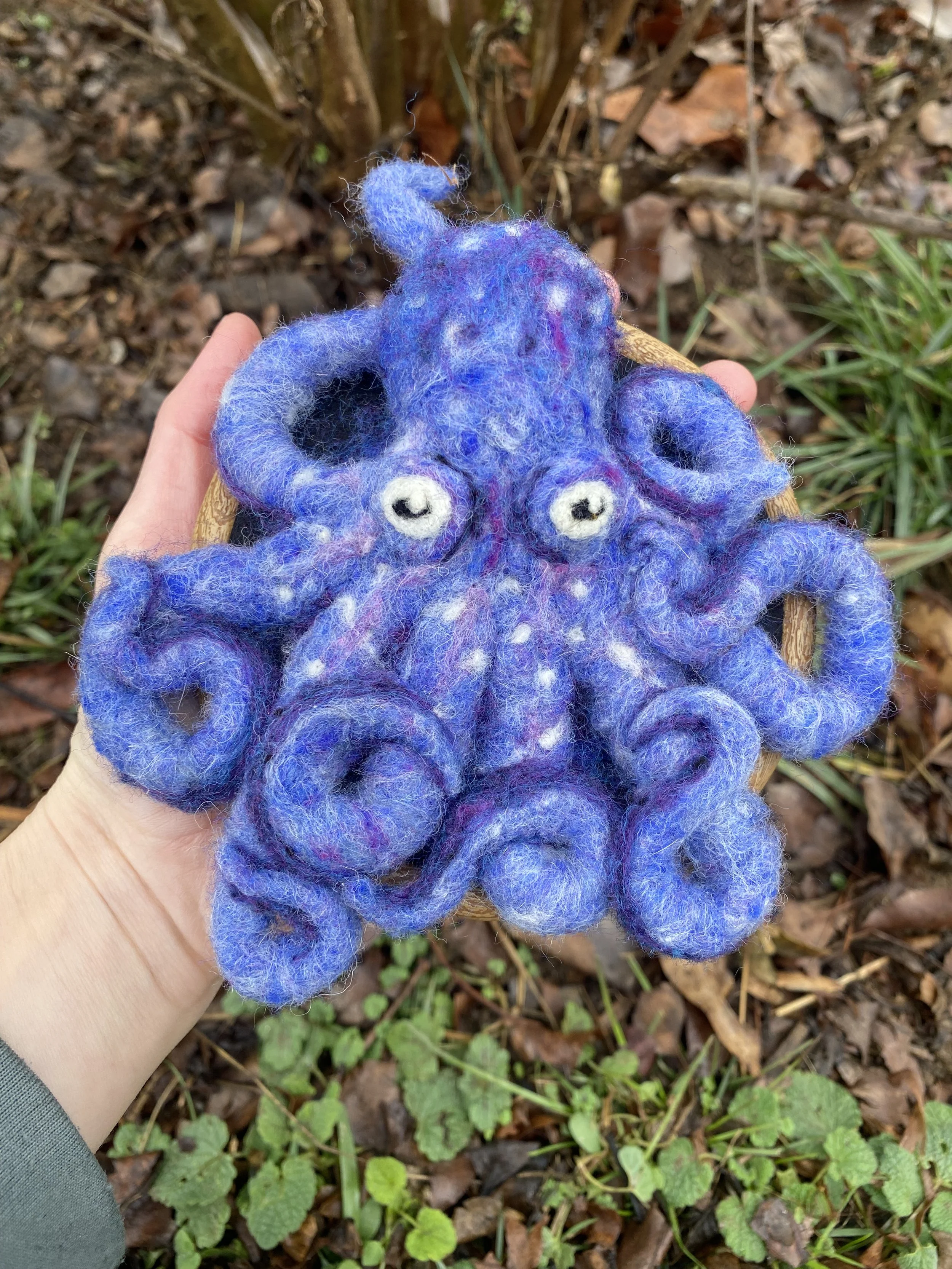 Purple octopus on embroidery hoop