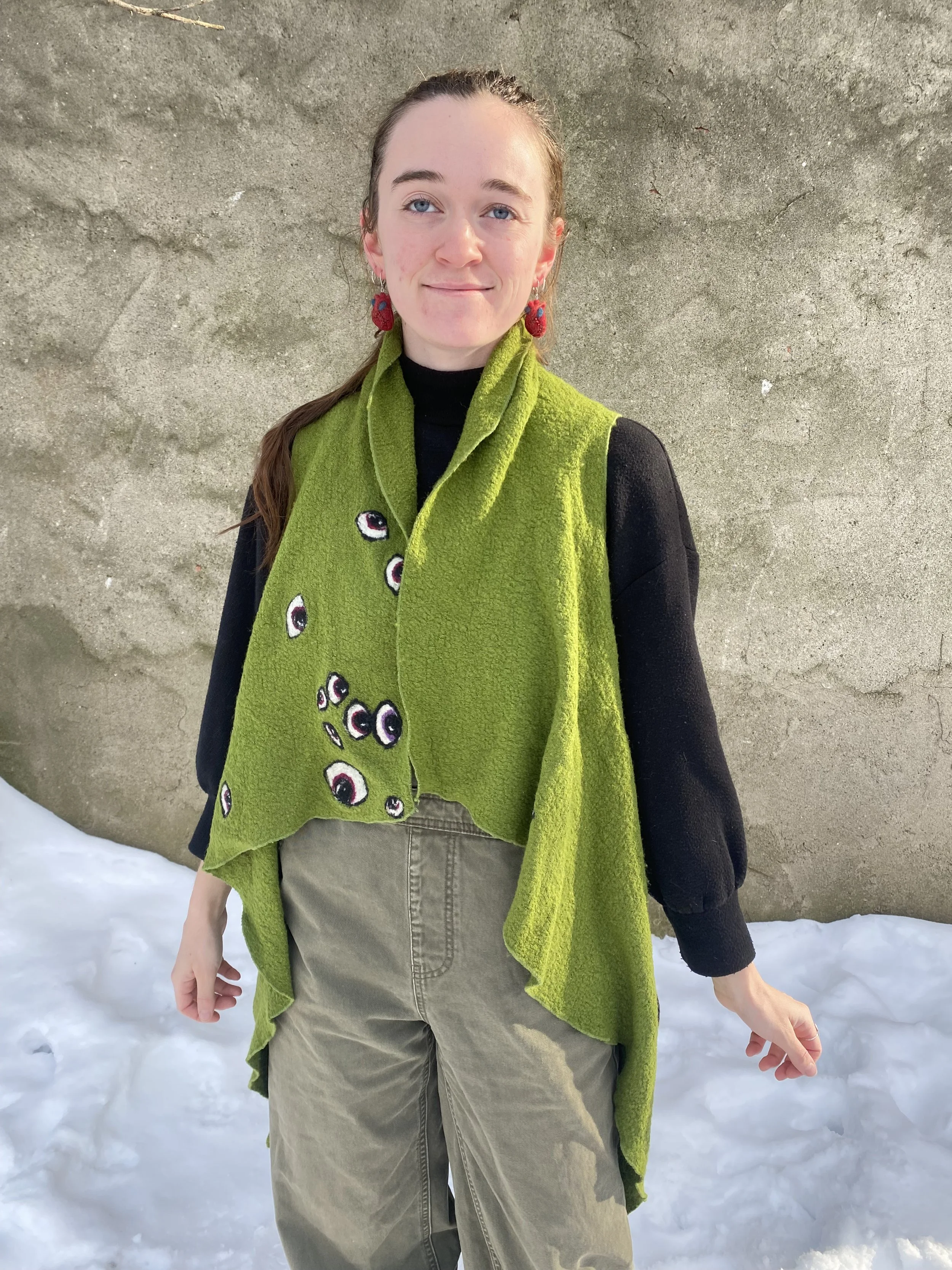 Green eyeball vest