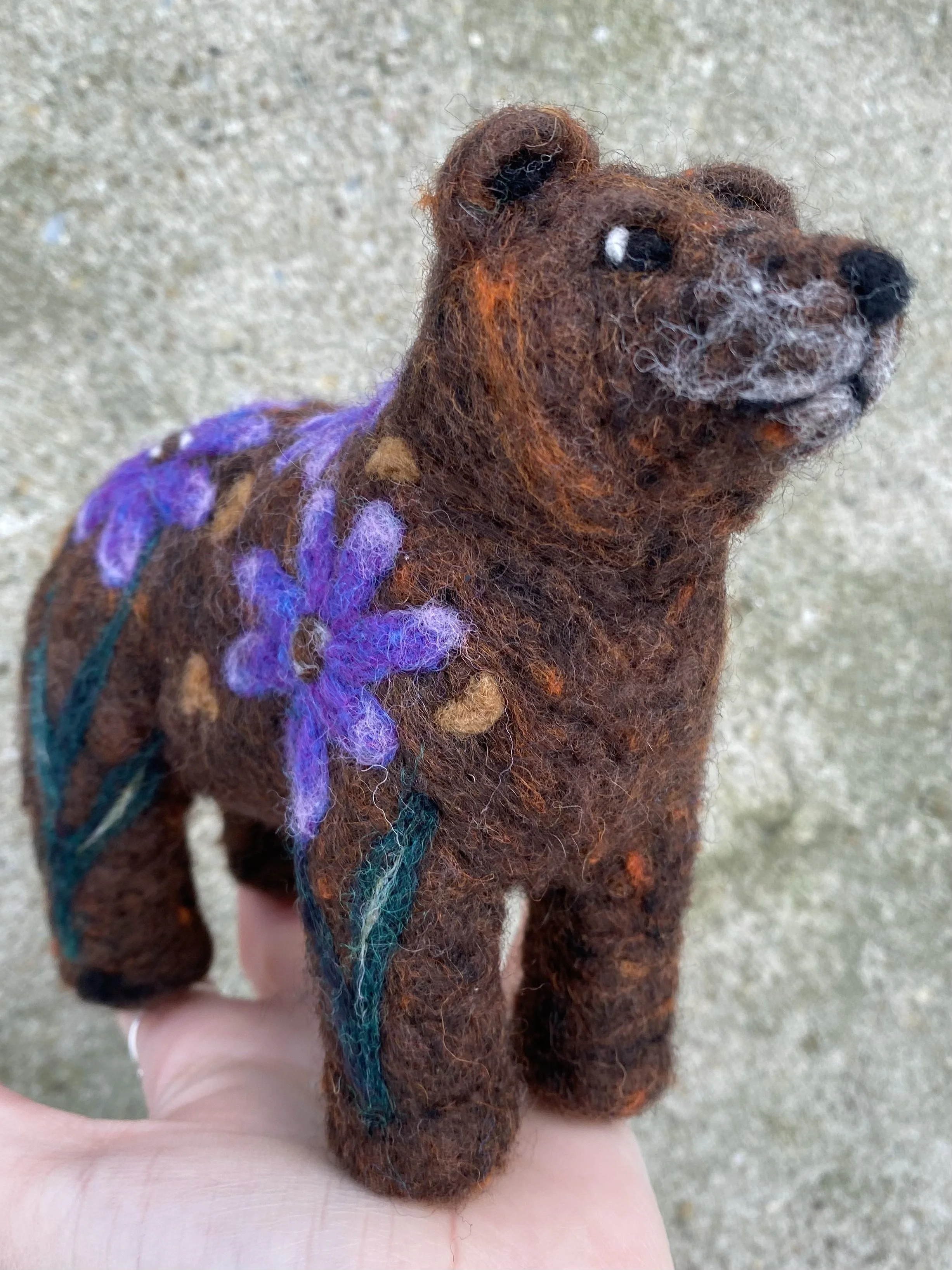 Bear with flowers
