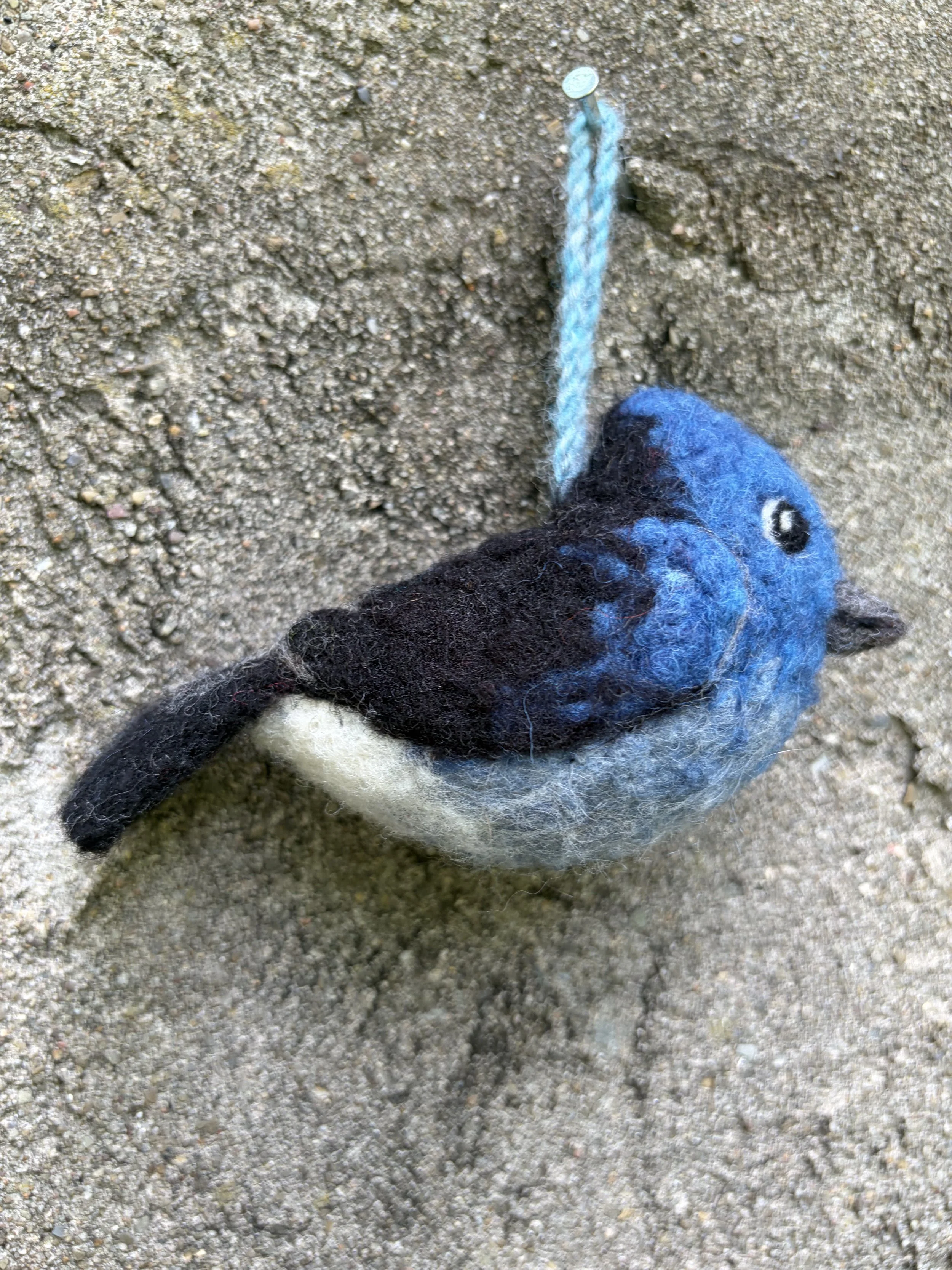 Blue and black bird ornament
