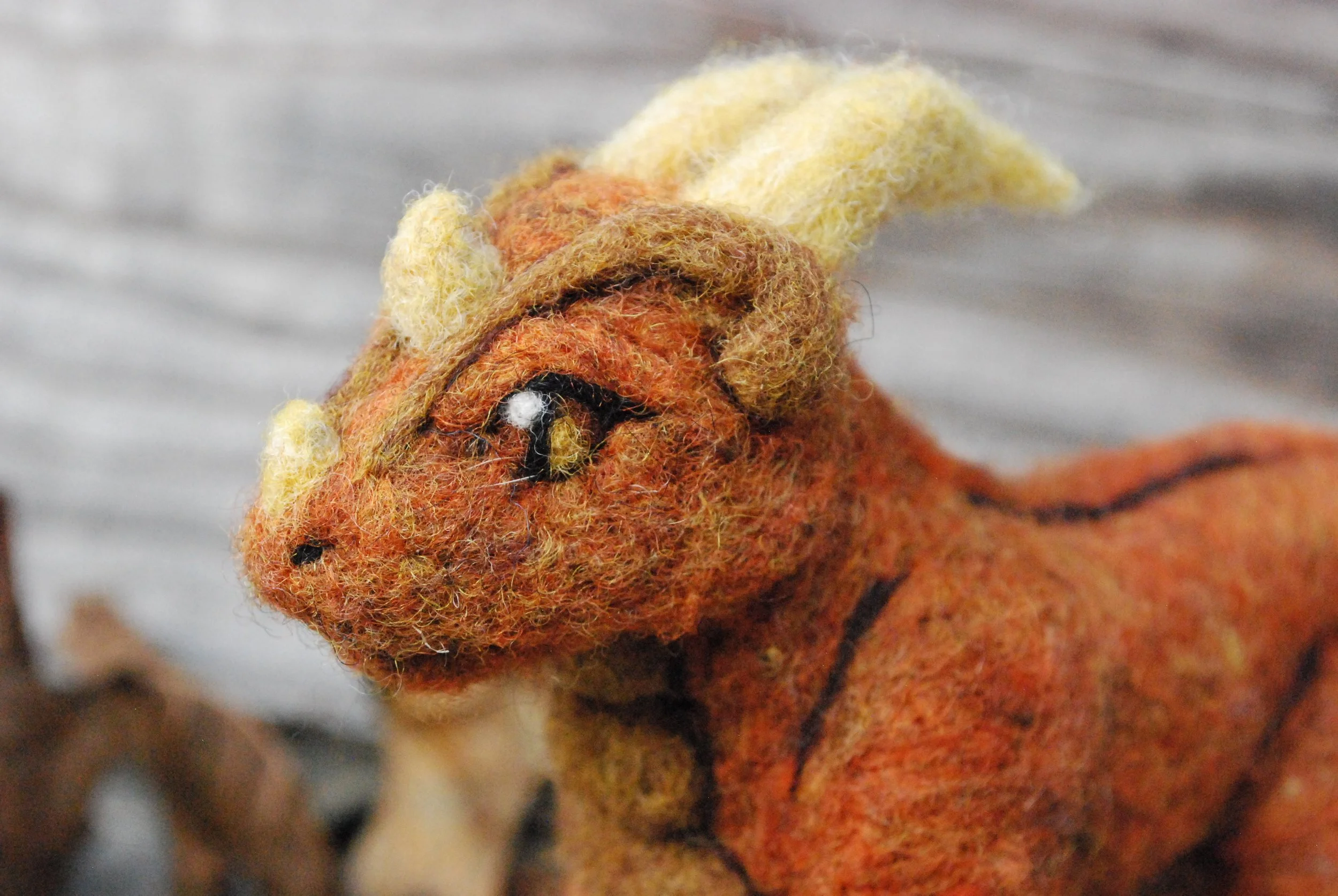 Posable orange dragon sculpture