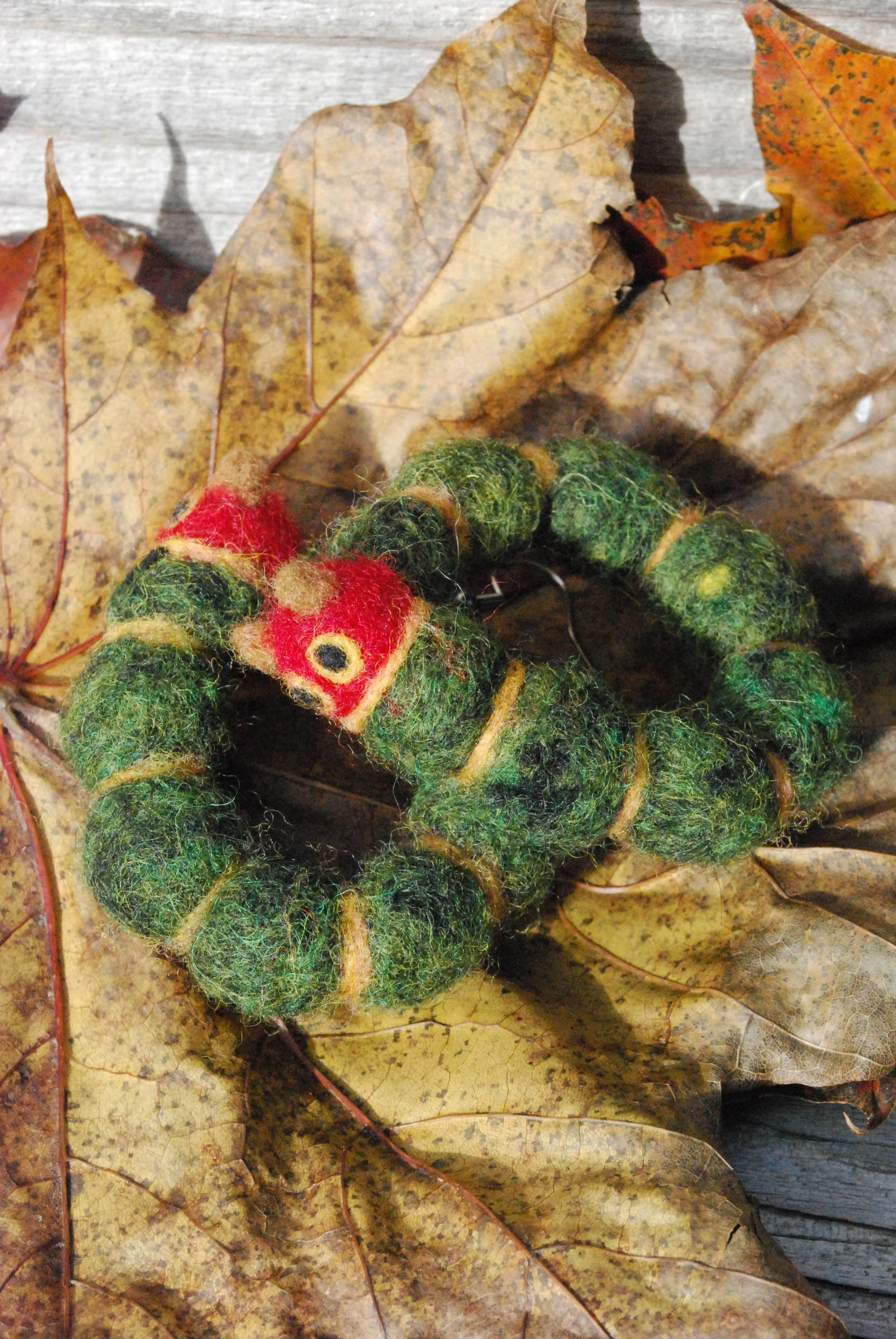 Caterpillar hoop earrings