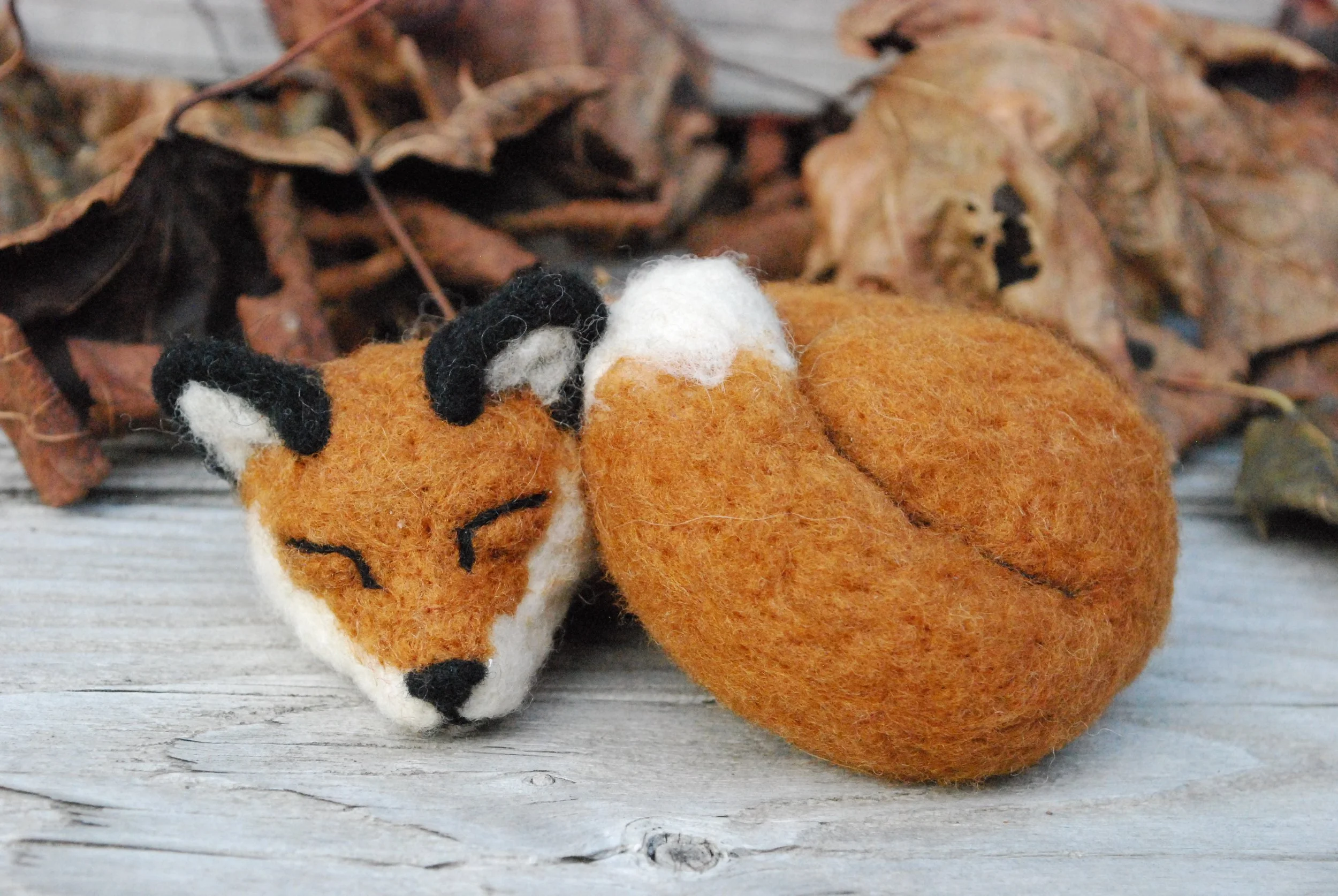Sleeping fox sculpture
