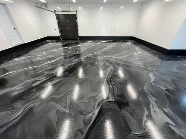 Black, light grey, medium grey, metallic epoxy flooring.