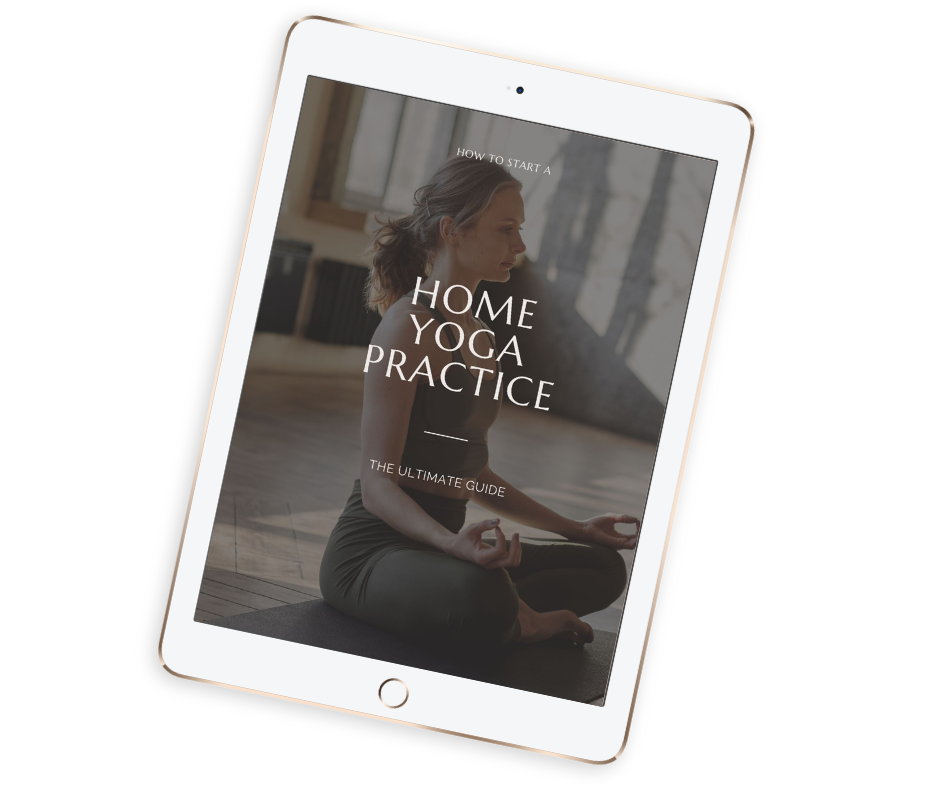 White tablet displaying a magazine or guide titled 'Home Yoga Practice' with a woman in a yoga pose in a brightly lit room with large windows.