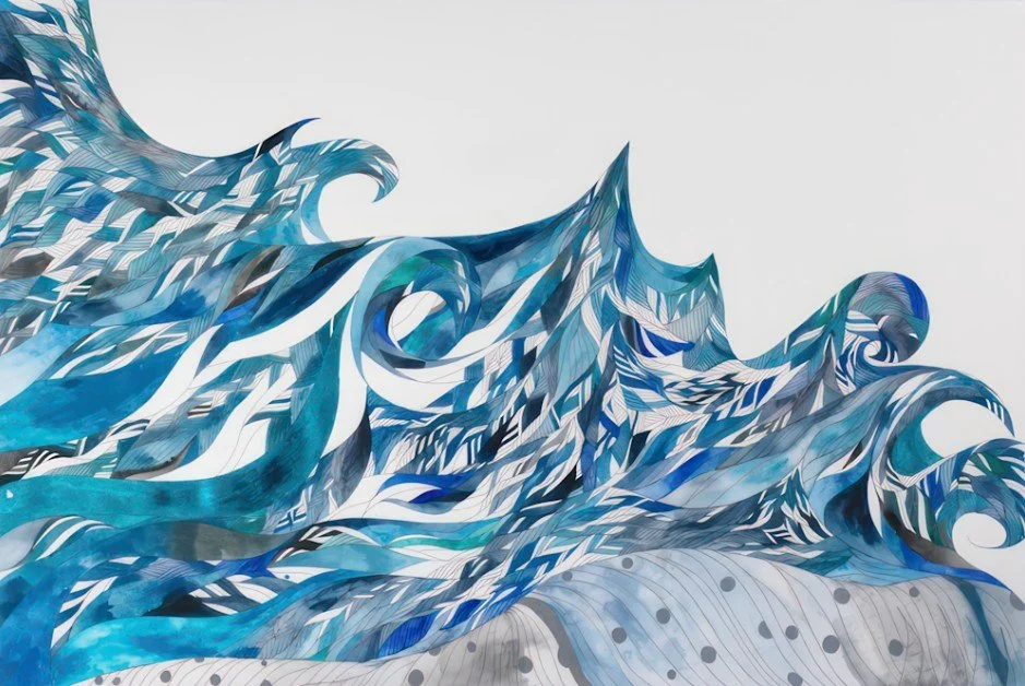 Sculpture resembling ocean waves made of layered blue, white, and black patterned materials.