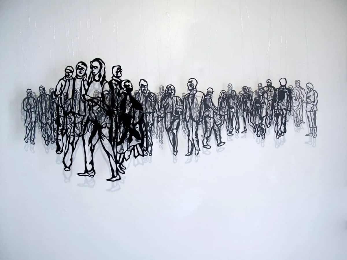 Line drawing of a crowd of people walking, with some figures overlapping and fading into the background.