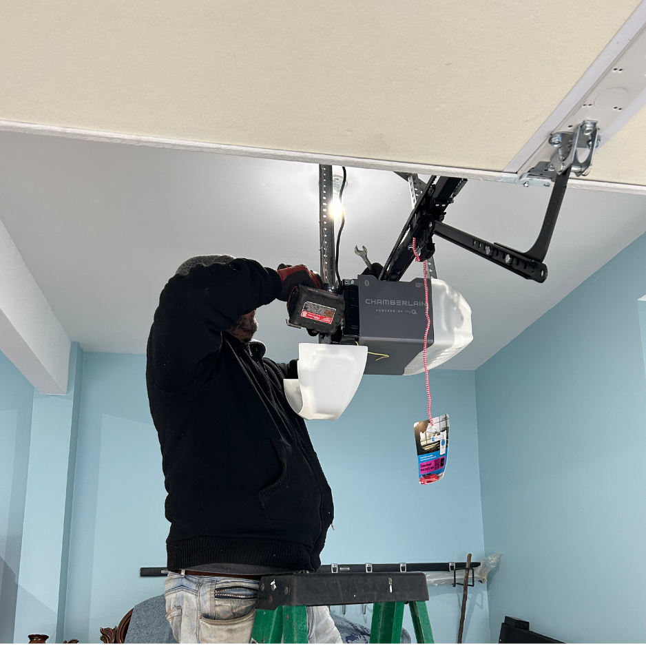 Luxreen Garage Door technician performing residential garage door repair