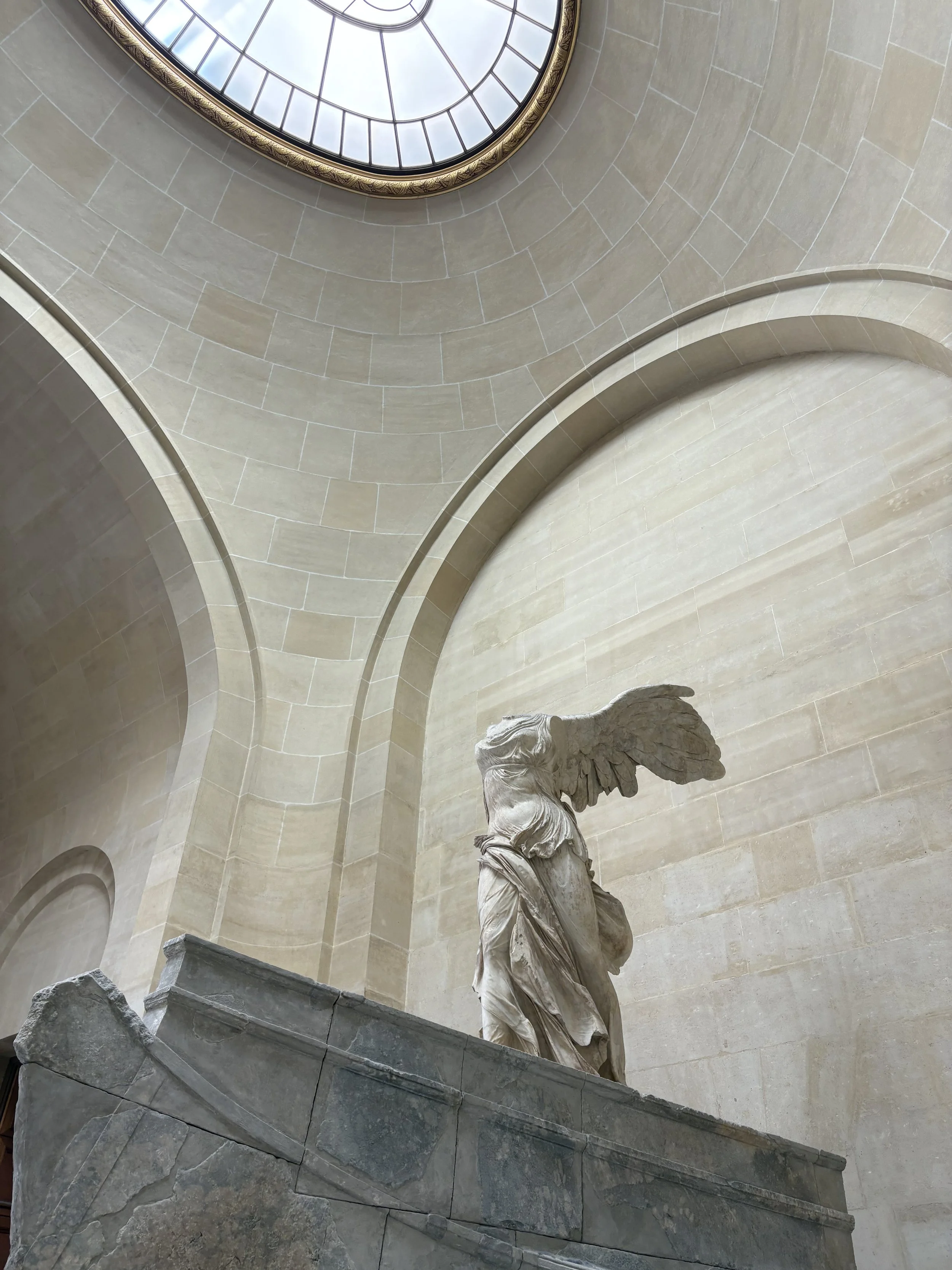 A marble statue in The Louvre