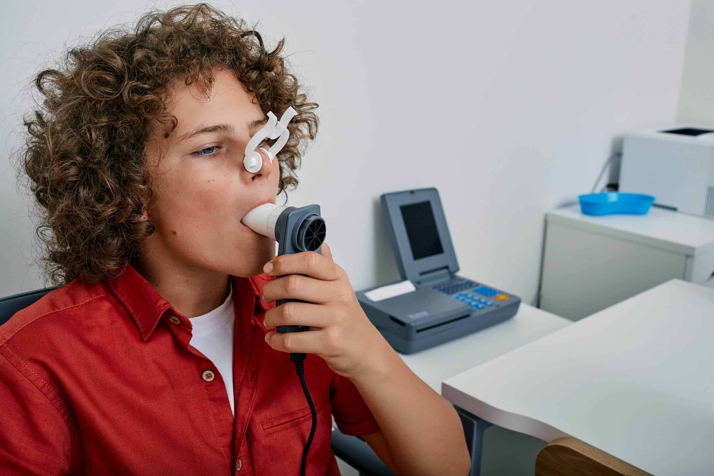 Someone managing their asthma.