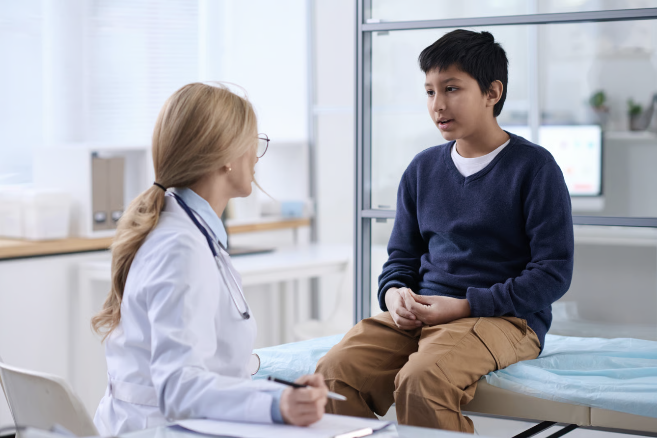 Child consulting with nurse.