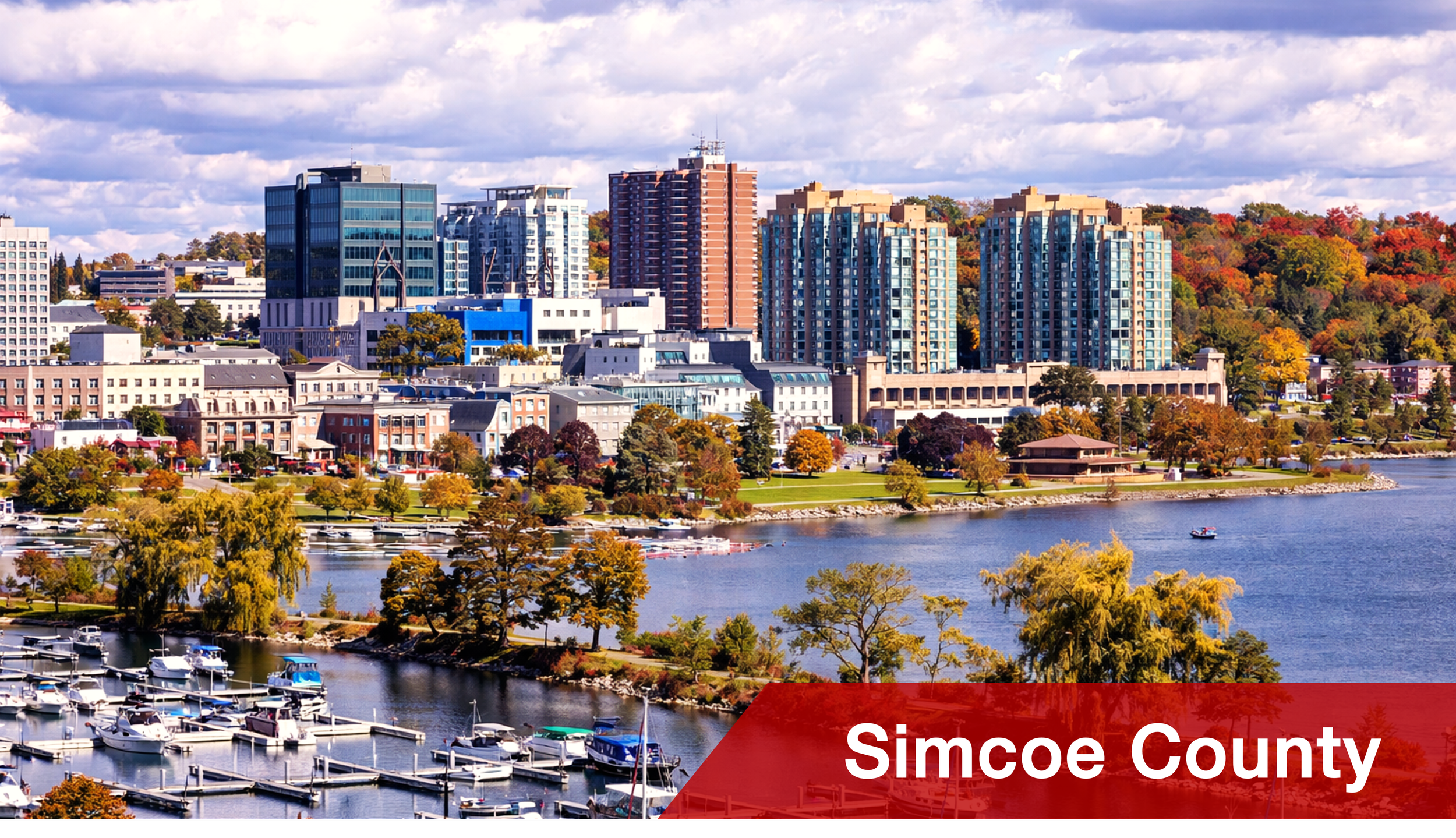 A city skyline with high-rise buildings, a body of water, and trees with autumn foliage featuring boats and docks in the foreground, and the text 'Simcoe County' in a red banner at the bottom.
