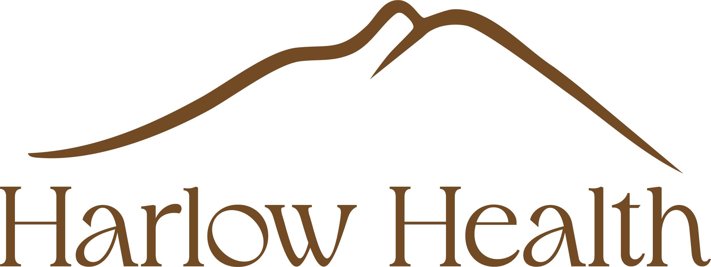 Brown mountain overtop Harlow Health