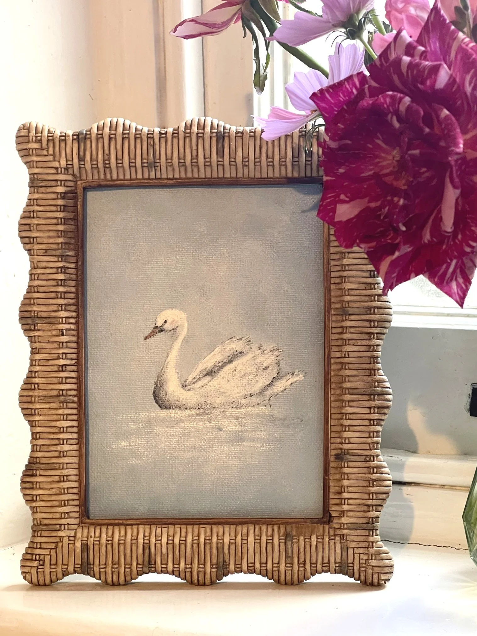 Swan in kitchen window with roses .JPEG