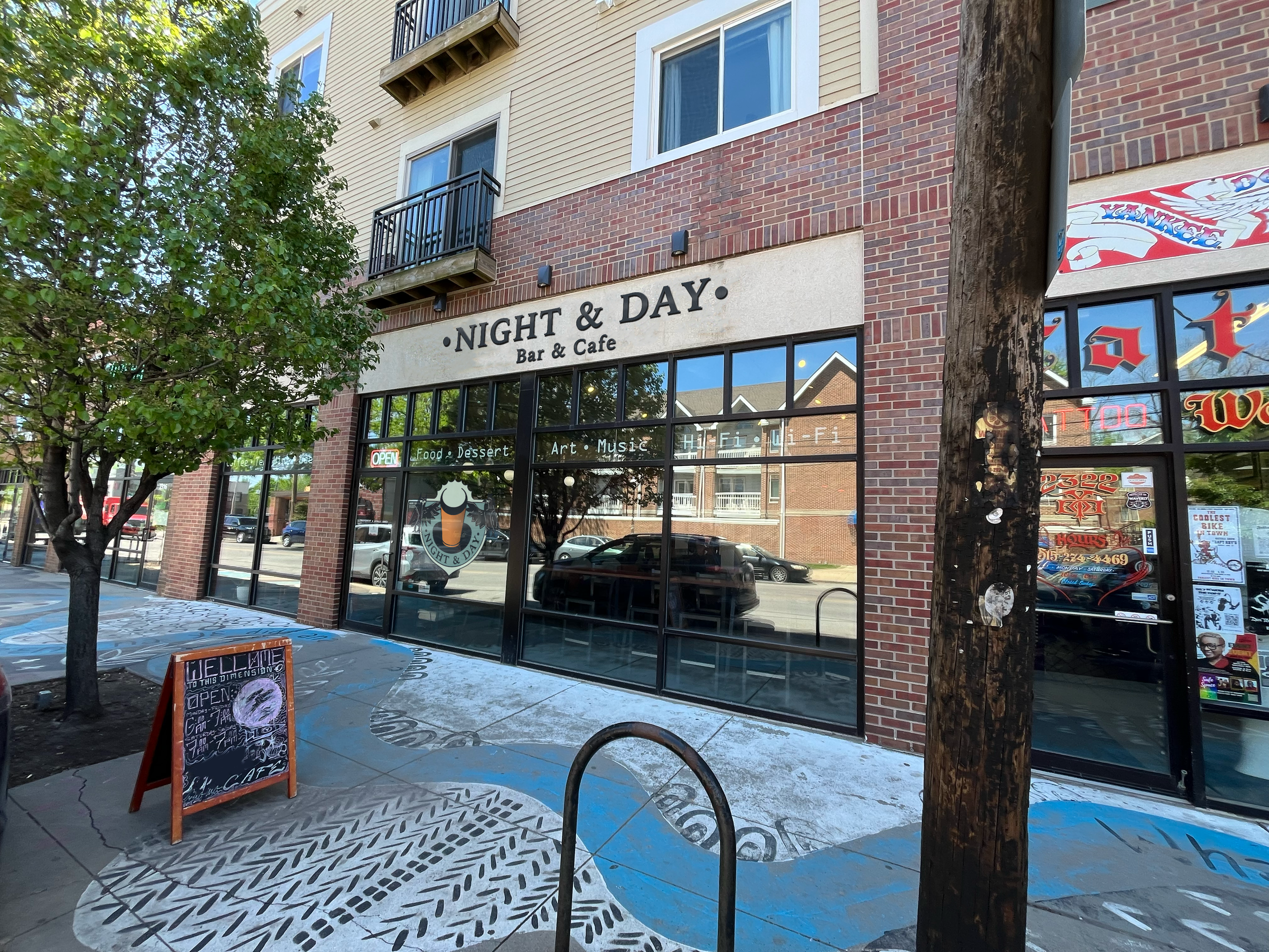 Storefront mockup with sign and display window sticker