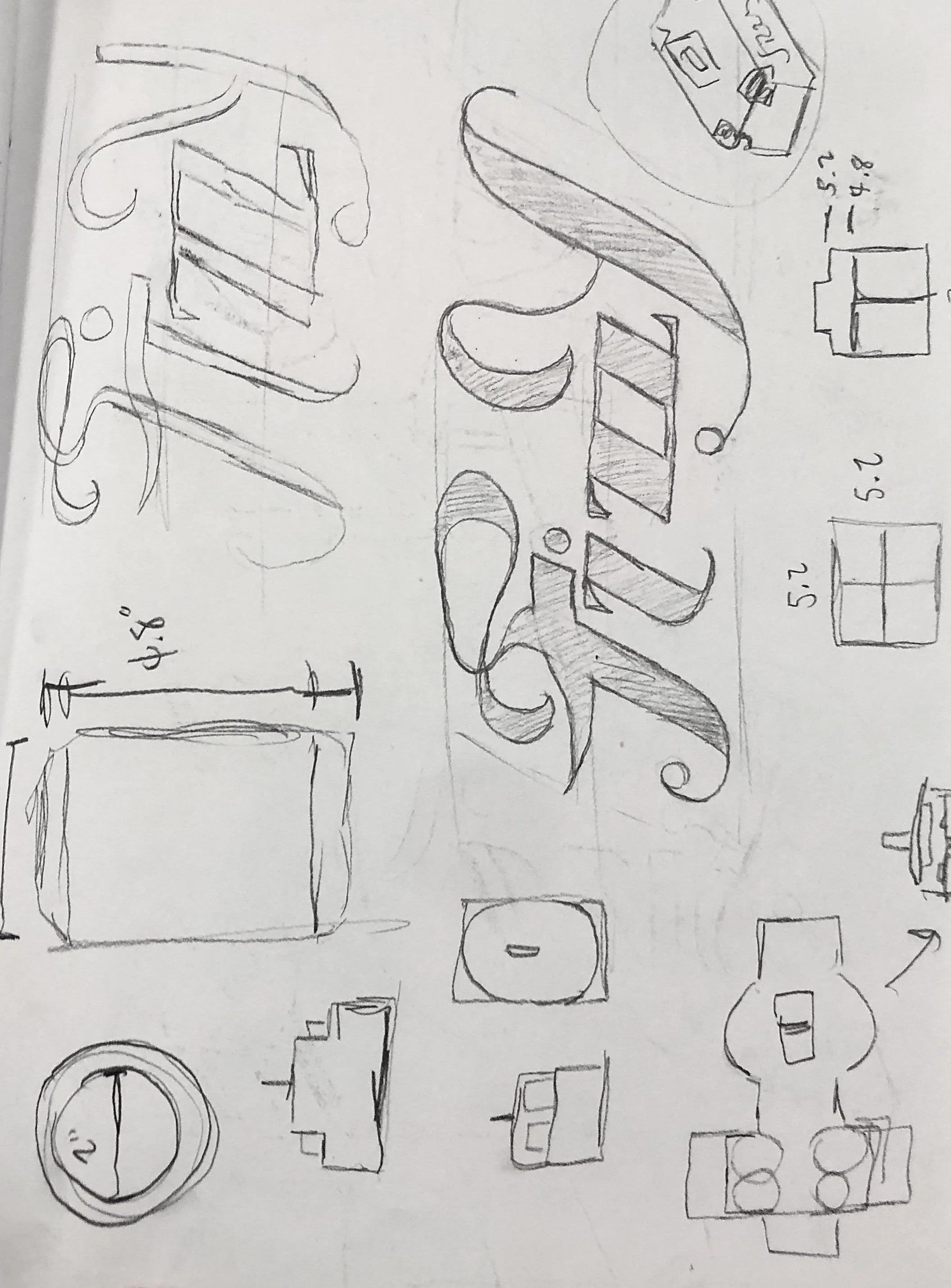Sketches of initial logos for Fizzy.
