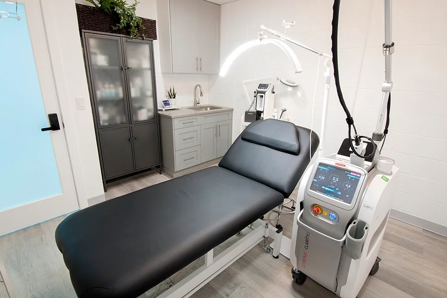 Skinfinite Glow treatment room, with Clarity II laser and HydraBrasion machine on display