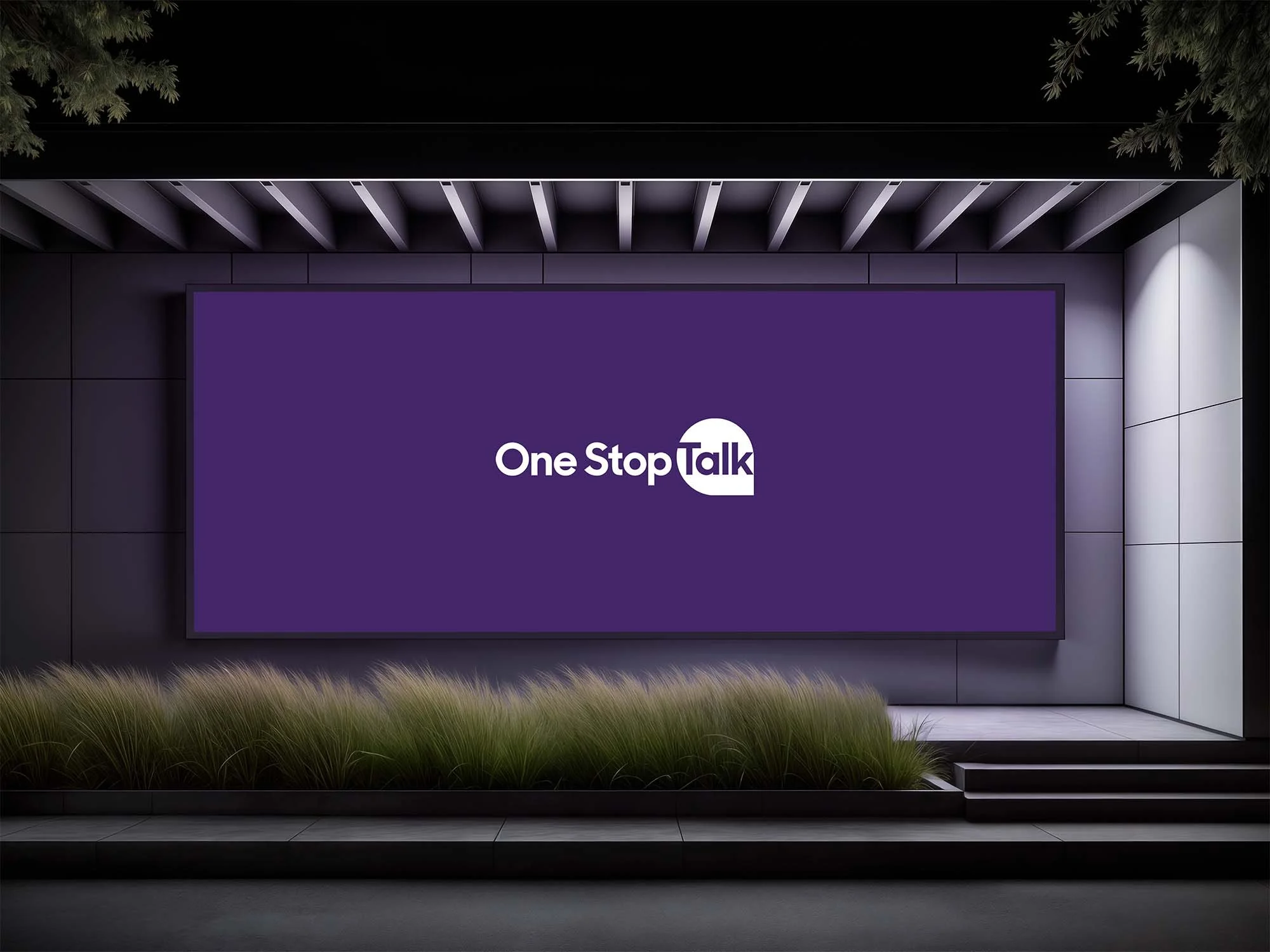 A digital billboard displaying the logo of 'One Stop Talk' with a purple background, located outside a modern building with stairs and surrounding greenery.