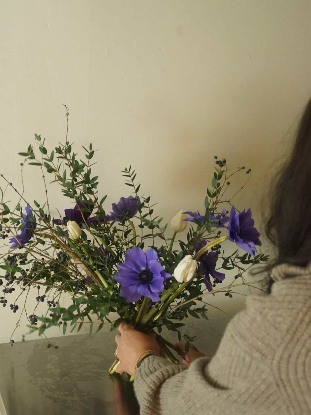 Flower Glossary: a small guide to the flowers we are working with this week. 

Anemones: fluttery, a little dramatic, and never here for long.
Tulips: winter-grown. These will continue to stretch and change throughout the week.
Privet berries: sturdy