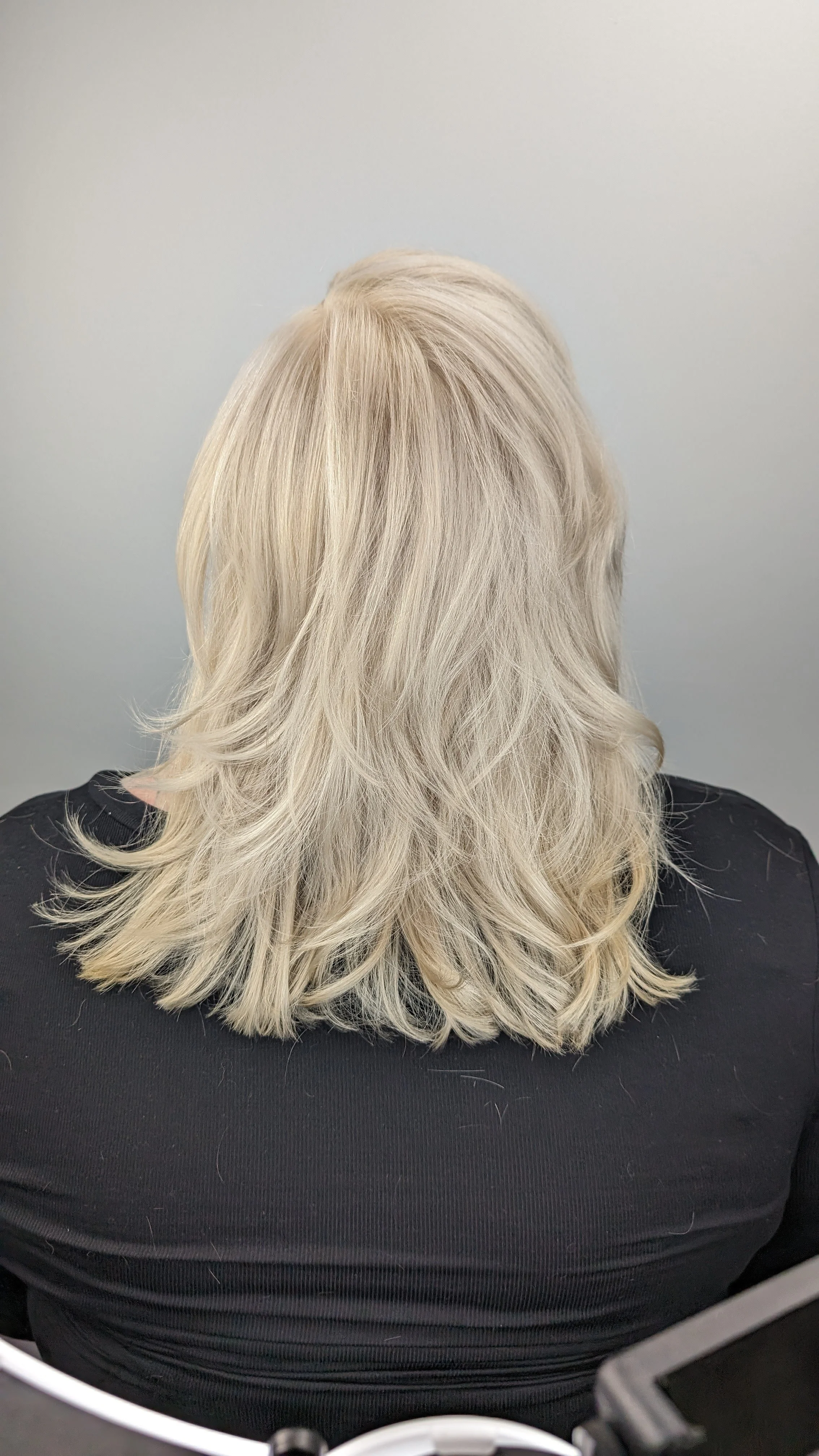 medium length creamy platinum blonde hair