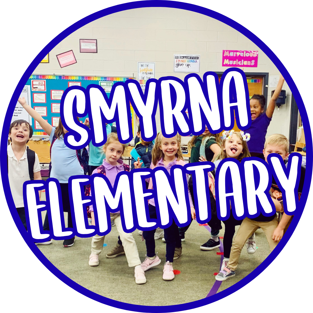 A classroom full of smiling young children posing happily with one child raising her arms. Overlaid text reads 'SMYRNA ELEMENTARY' in bold blue and white letters. The background shows classroom decor and bulletin boards.