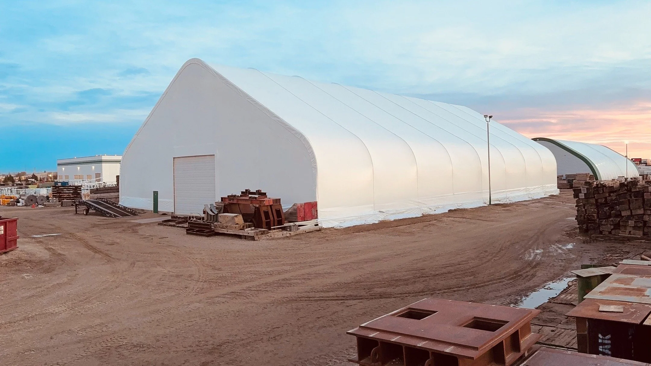 📍 Acheson, AB
Recover complete with new keder panels and brand-new end walls on both buildings.

These structures are now sealed, tensioned, and ready for another 20 years of protecting valuable equipment and investments&mdash;built to perform in Al