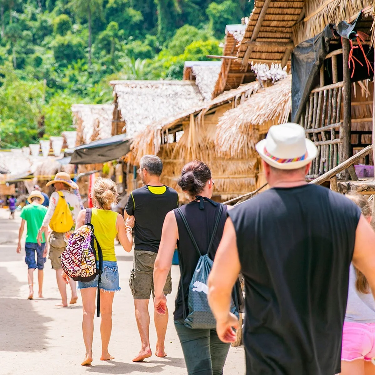 Tourists visiting the Moken village on Surin Island