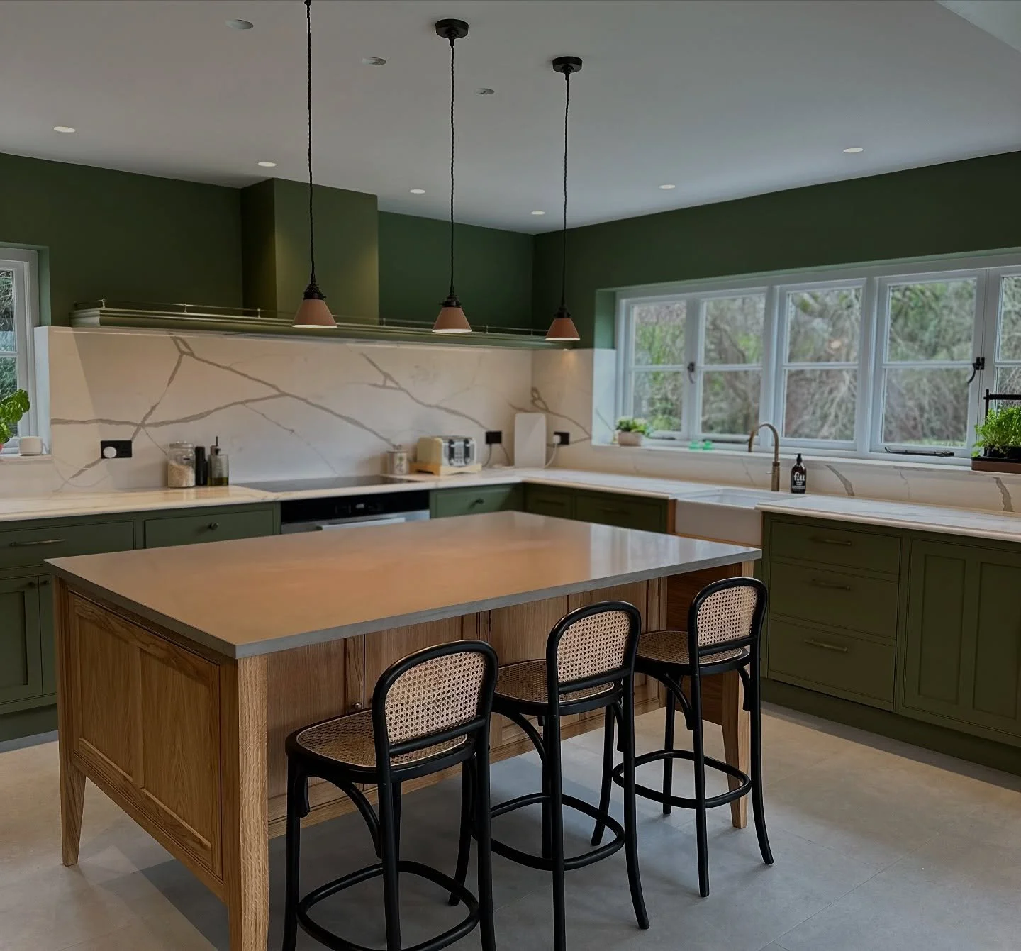 ✨ A kitchen that balances calm, character &amp; clever design.

We&rsquo;re obsessed with this @griggsandmackay renovation - the earthy green cabinetry, statement marble splashback, and oak island create the perfect mix of timeless and modern.

Want 