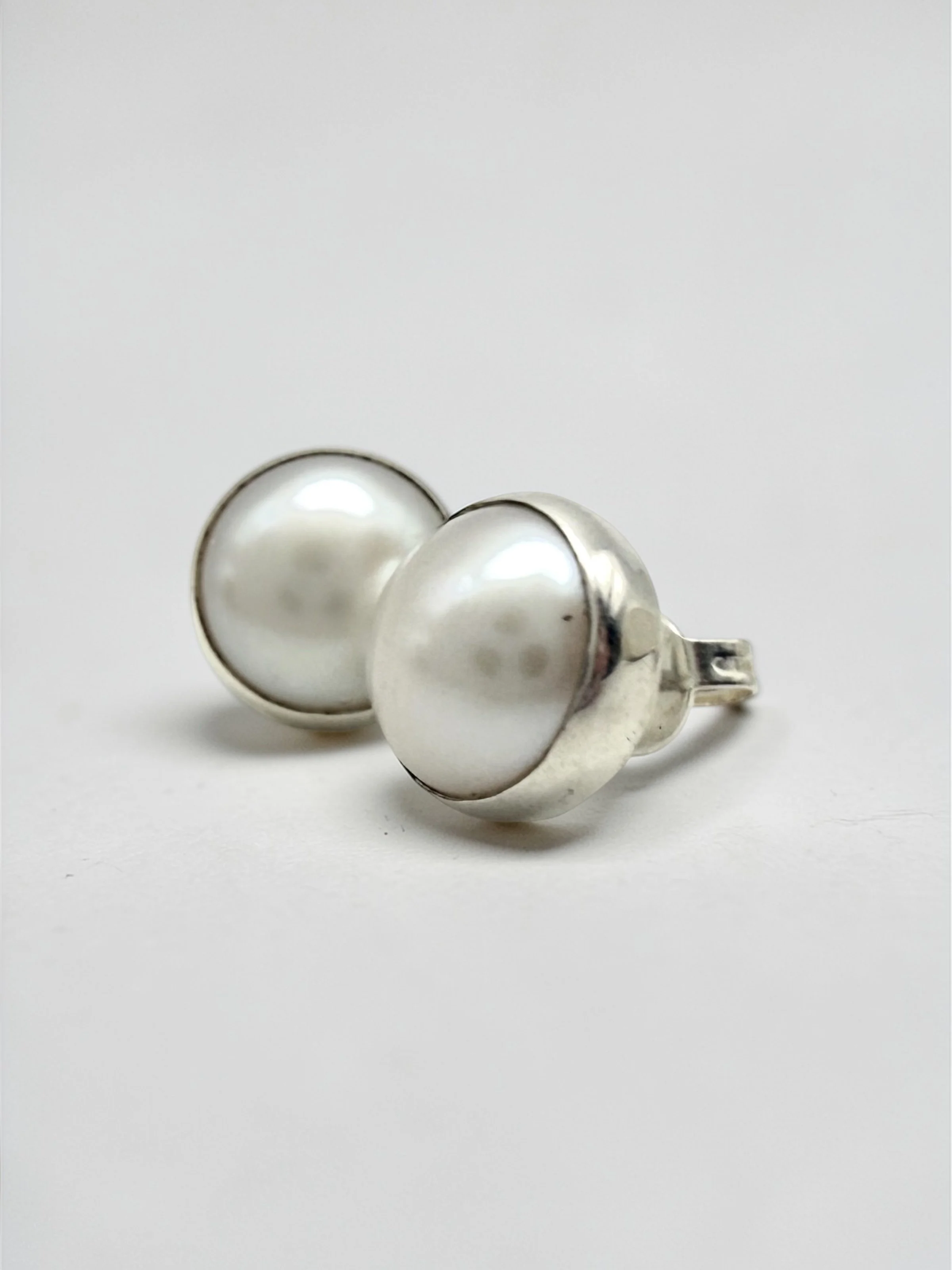 Aretes circulares de perlas