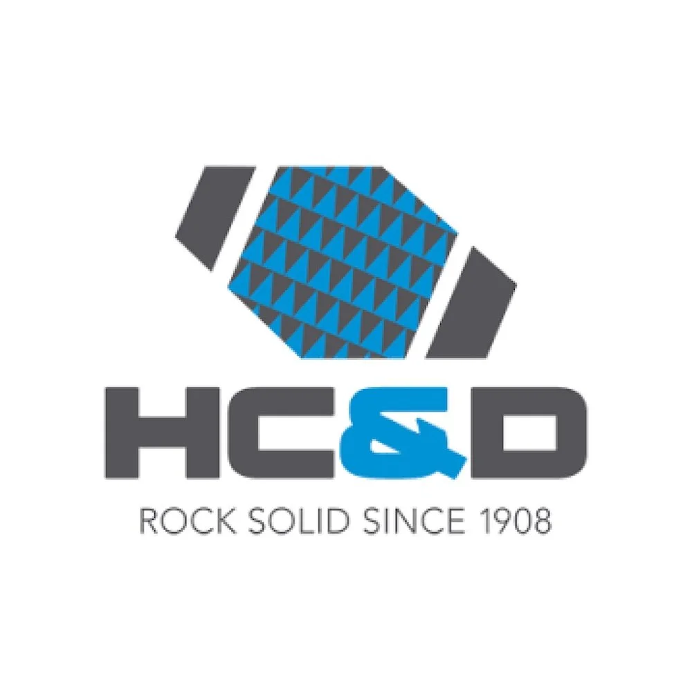 Company logo for HC&D with a geometric rock pattern and the tagline "Rock solid since 1908".