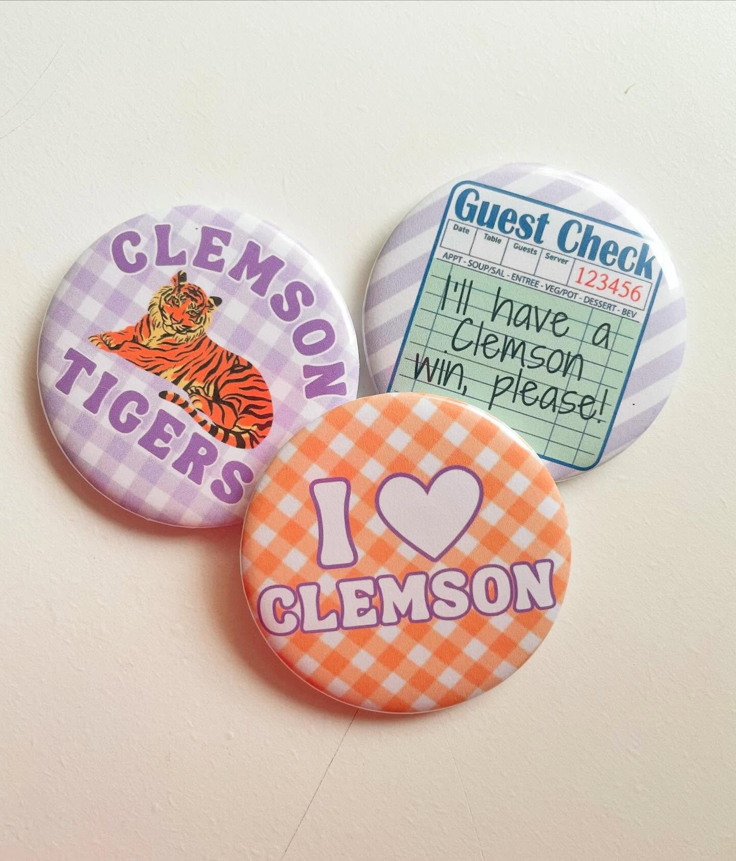 #gameday essentials!! the cutest clemson buttons for tiger fans 💜🐅