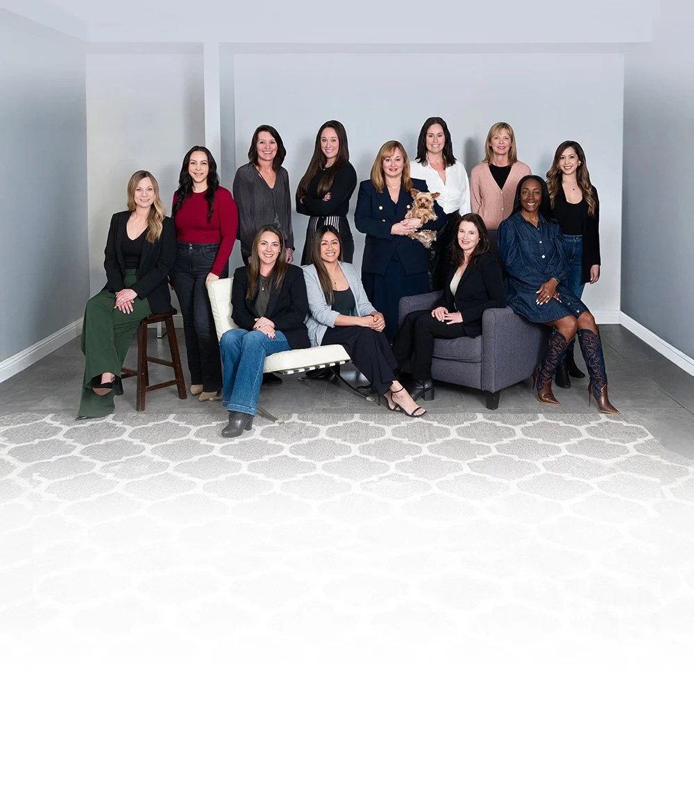 Group of professional women and one dog in a modern living room