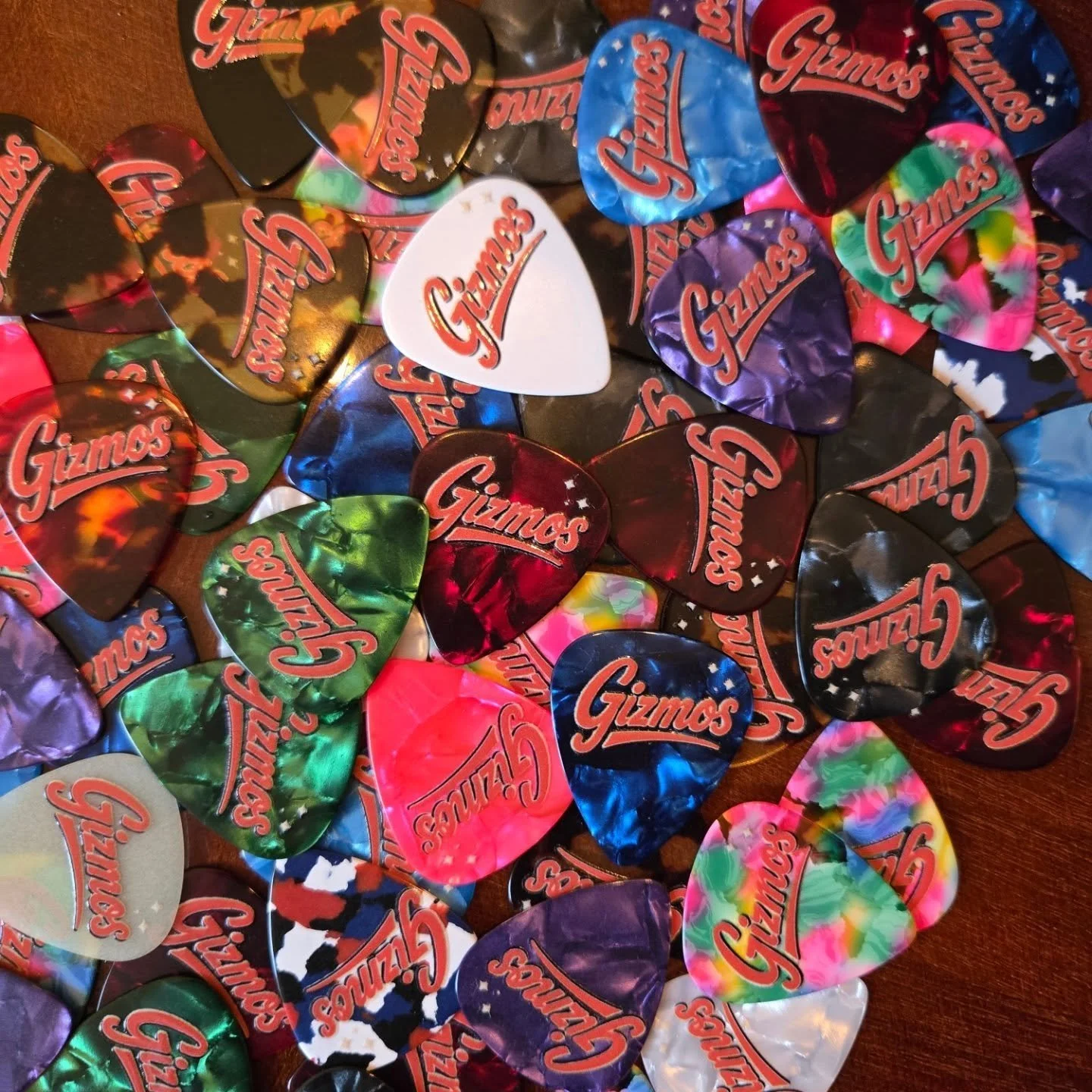 Custom guitar picks using dtf printed by @_inkydoo