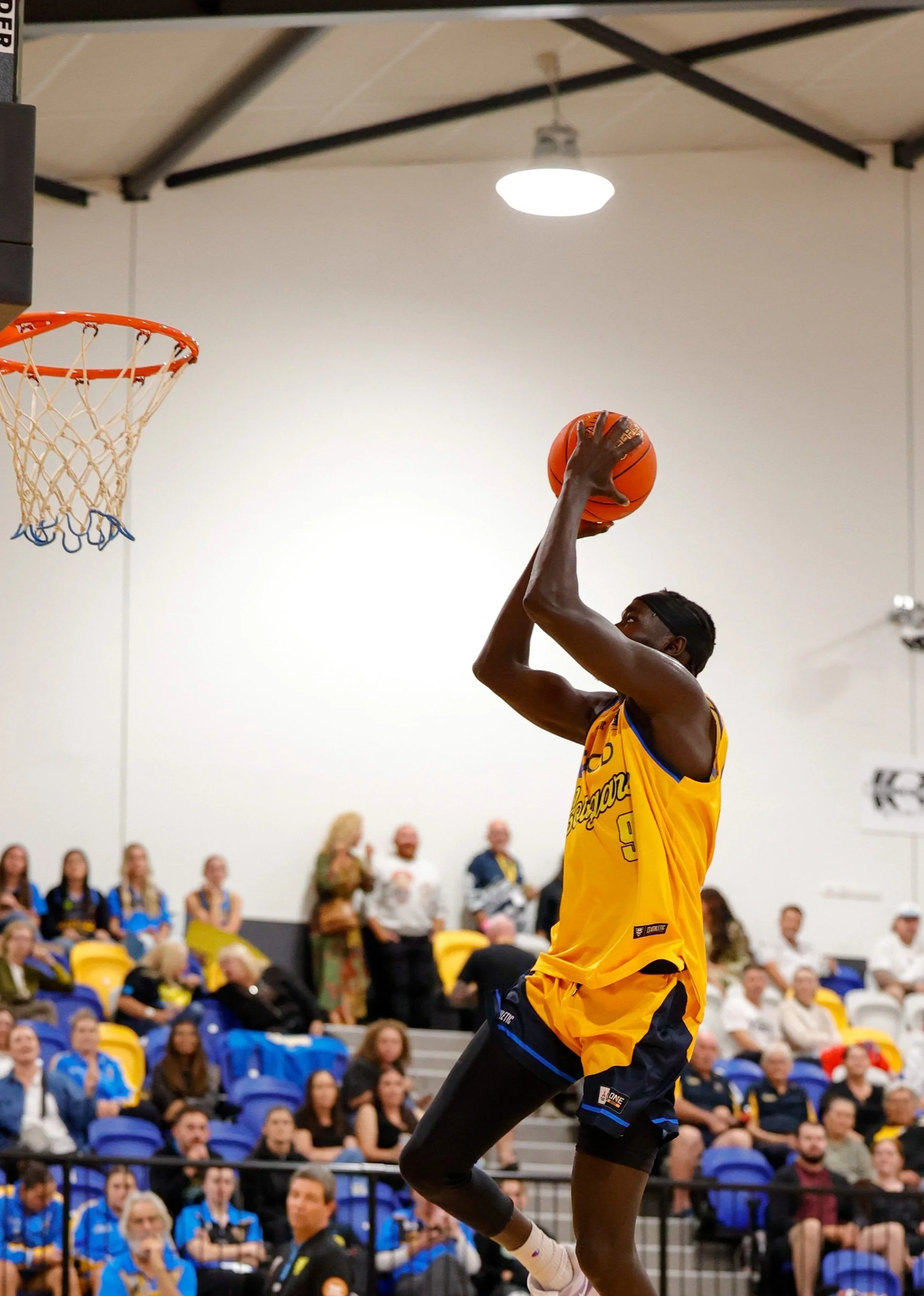 Chan rising to dunk in an NBL1 game