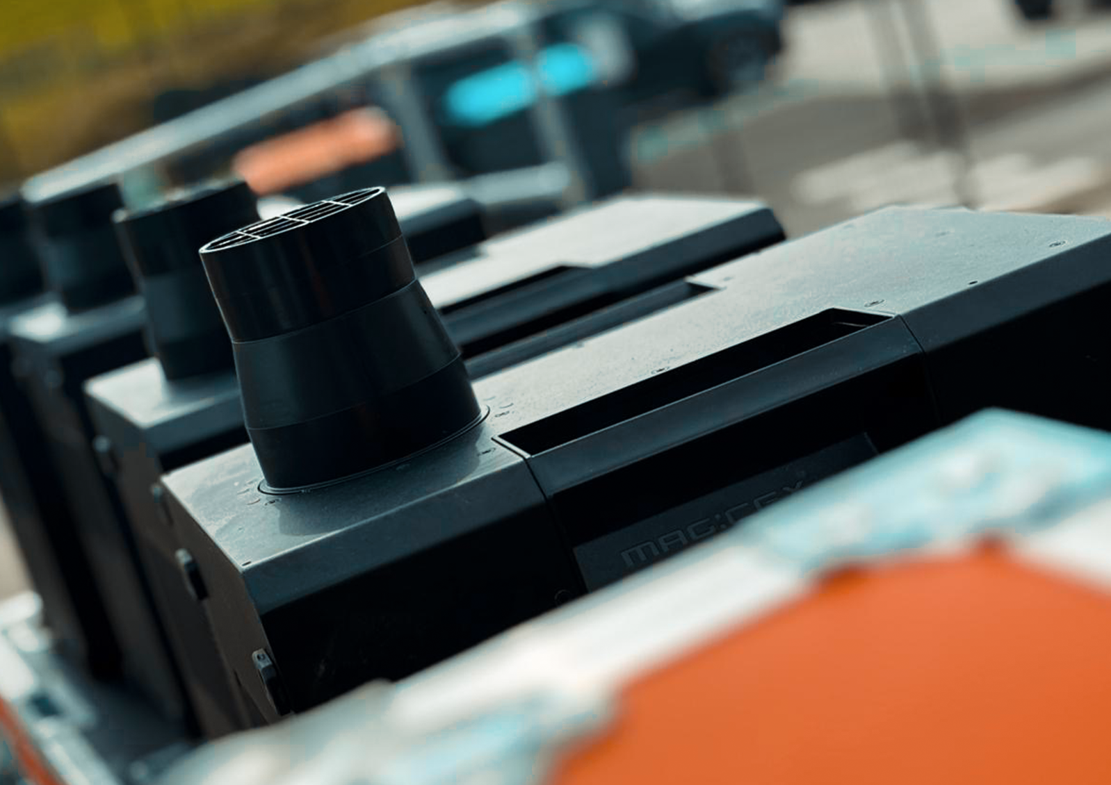 Close-up of a black tuning knob on an electronic musical instrument, possibly a keyboard or synthesizer, with other controls visible in the background.