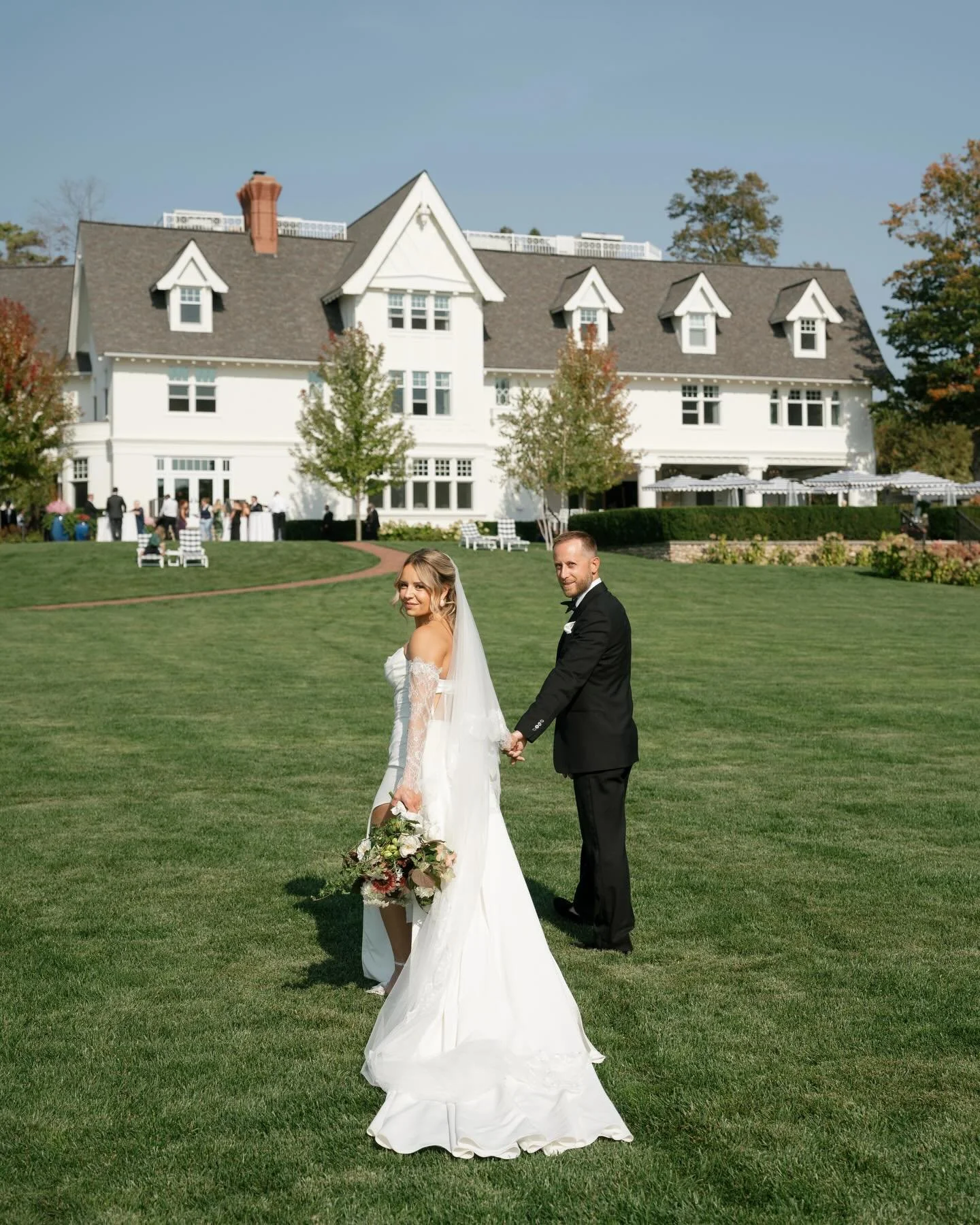 Breanne + Stephen chose Mackinac Island for a wedding that felt timeless in every way. From ferry rides to horse-drawn carriages, every part of the day was slow and intentional. They exchanged vows overlooking Lake Huron with the Mackinac Bridge in t