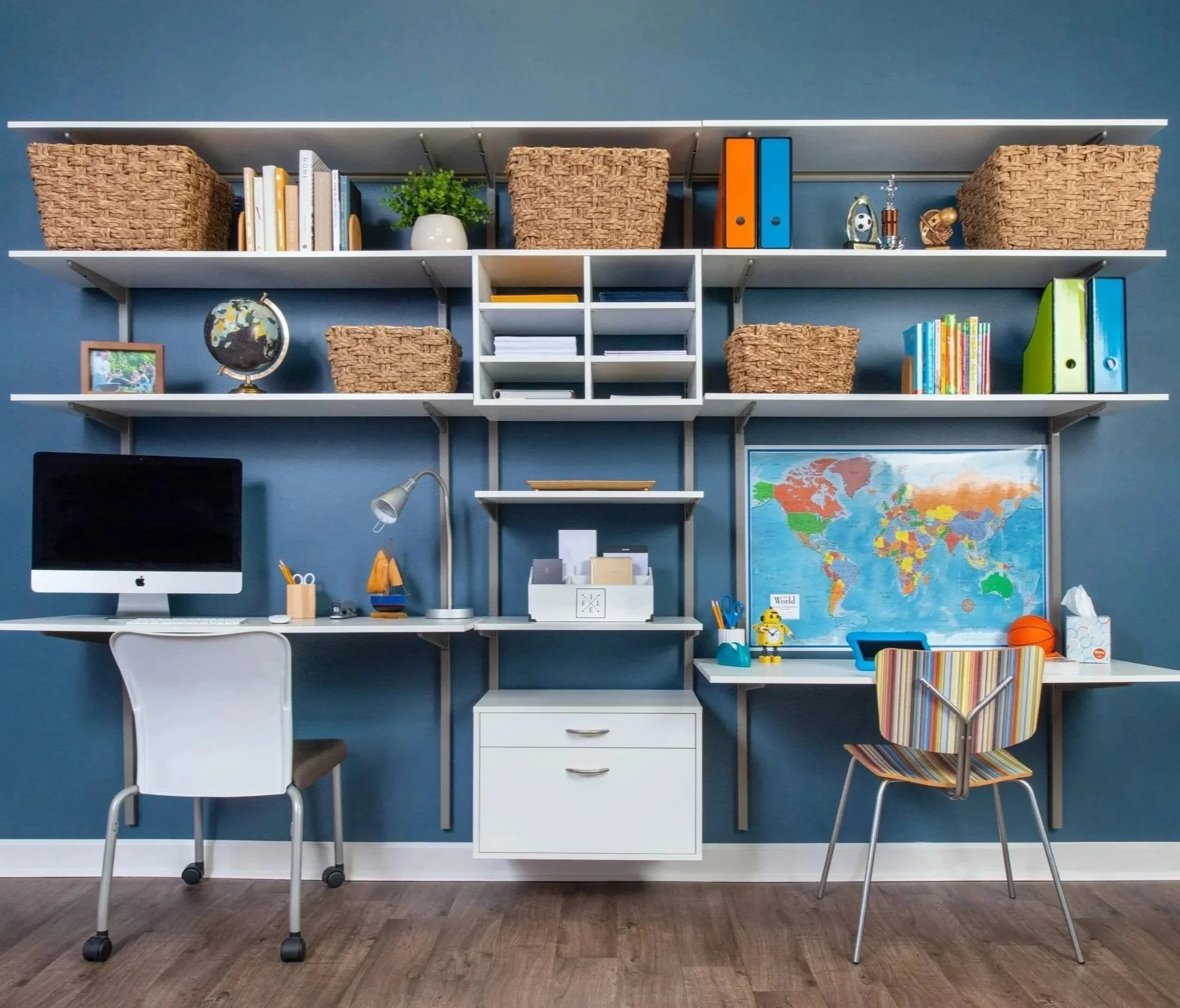Organized workspace for 2 people — parent's home office and child's study area — featuring adjustable drawers, cubbies, and shelves as well as 2 adjustable desktops