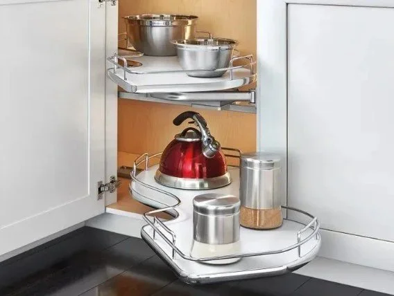 Kitchen cabinet with pull-out shelves to make use of a blind corner area