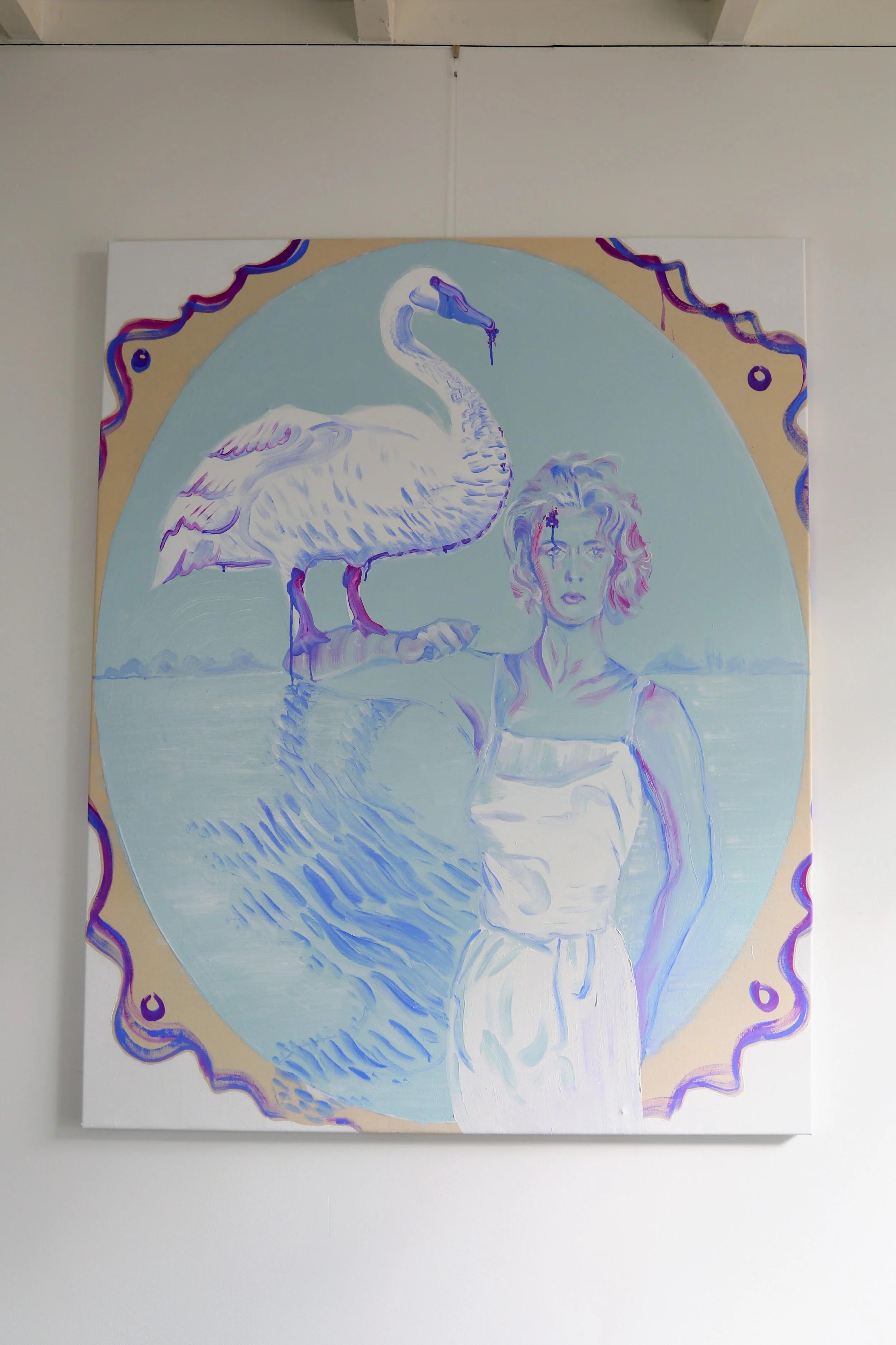Artwork featuring a woman with a large swan on her shoulder, set against a lake background with decorative border elements.