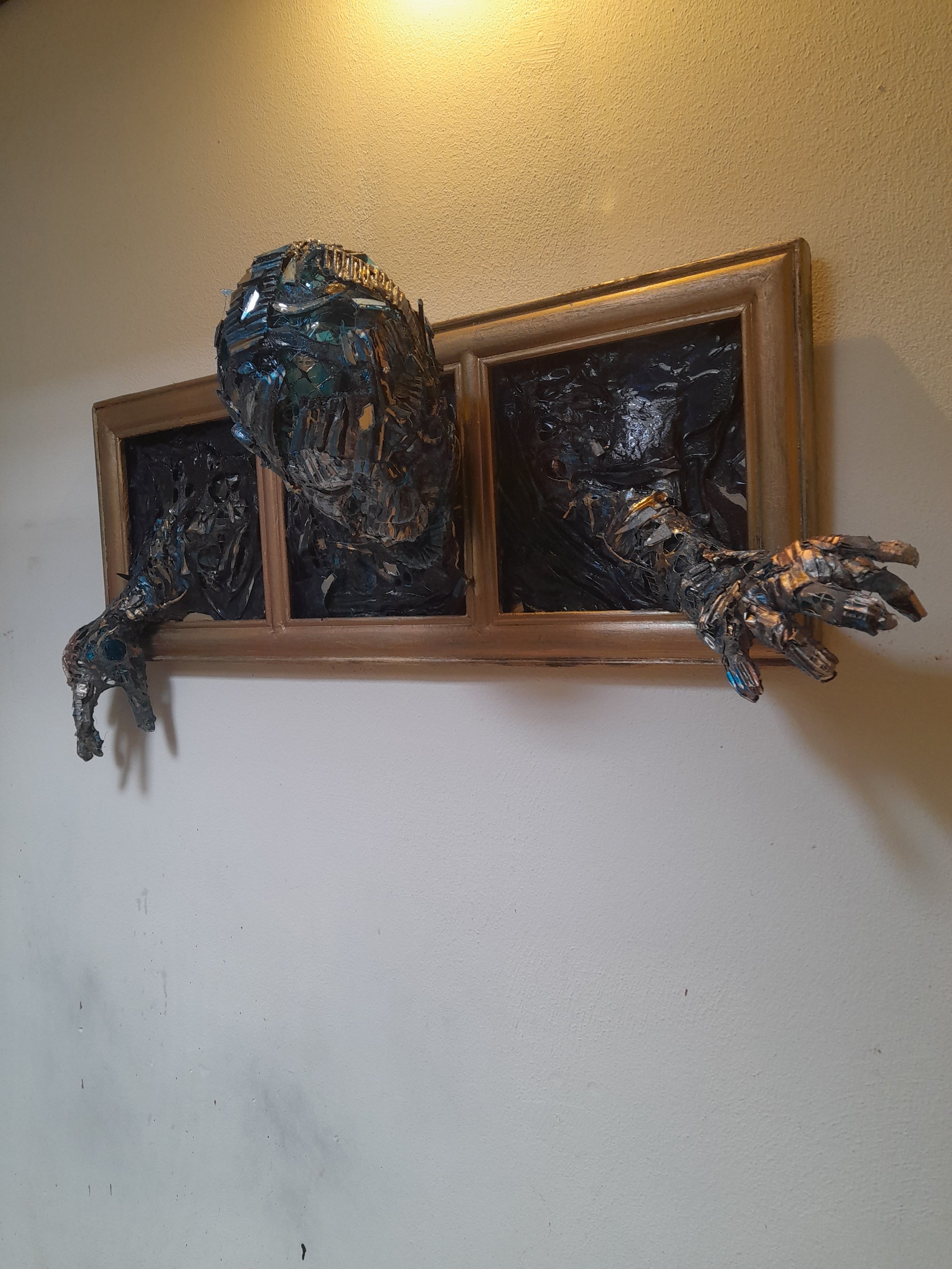 wall sculpure creature.jpg