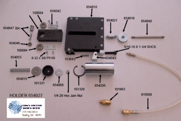 An assortment of mechanical and electronic components laid out on a flat surface, including motors, screws, nuts, adapters, and connectors, with labels and a Couter Services sticker.